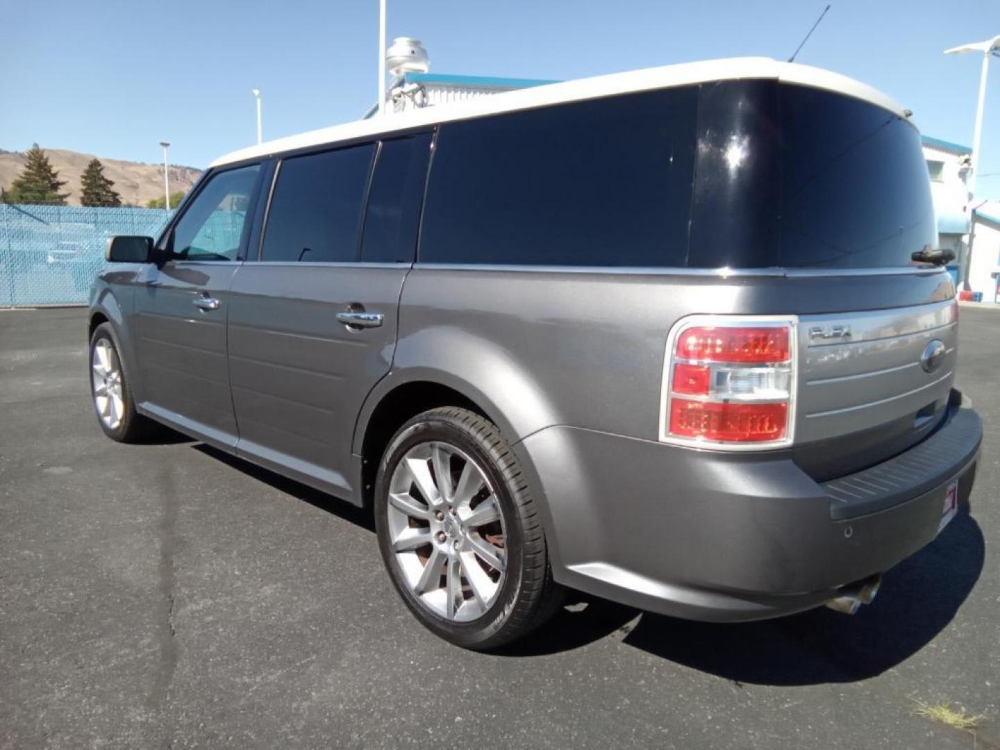 2010 Sterling Gray Metallic /Medium Light Stone Ford Flex Limited AWD (2FMHK6DC9AB) with an 3.5L V6 DOHC 24V engine, 6-Speed Automatic Overdrive transmission, located at 6064 Gull Rd, Kalamazoo, MI, 49048, (269) 222-0088, 42.328388, -85.512924 - <b>Equipment</b><br>This model offers Automatic Climate Control for personalized comfort. The state of the art park assist system will guide you easily into any spot. The installed navigation system will keep you on the right path. Bluetooth technology is built into this vehicle, keeping your hands - Photo#7