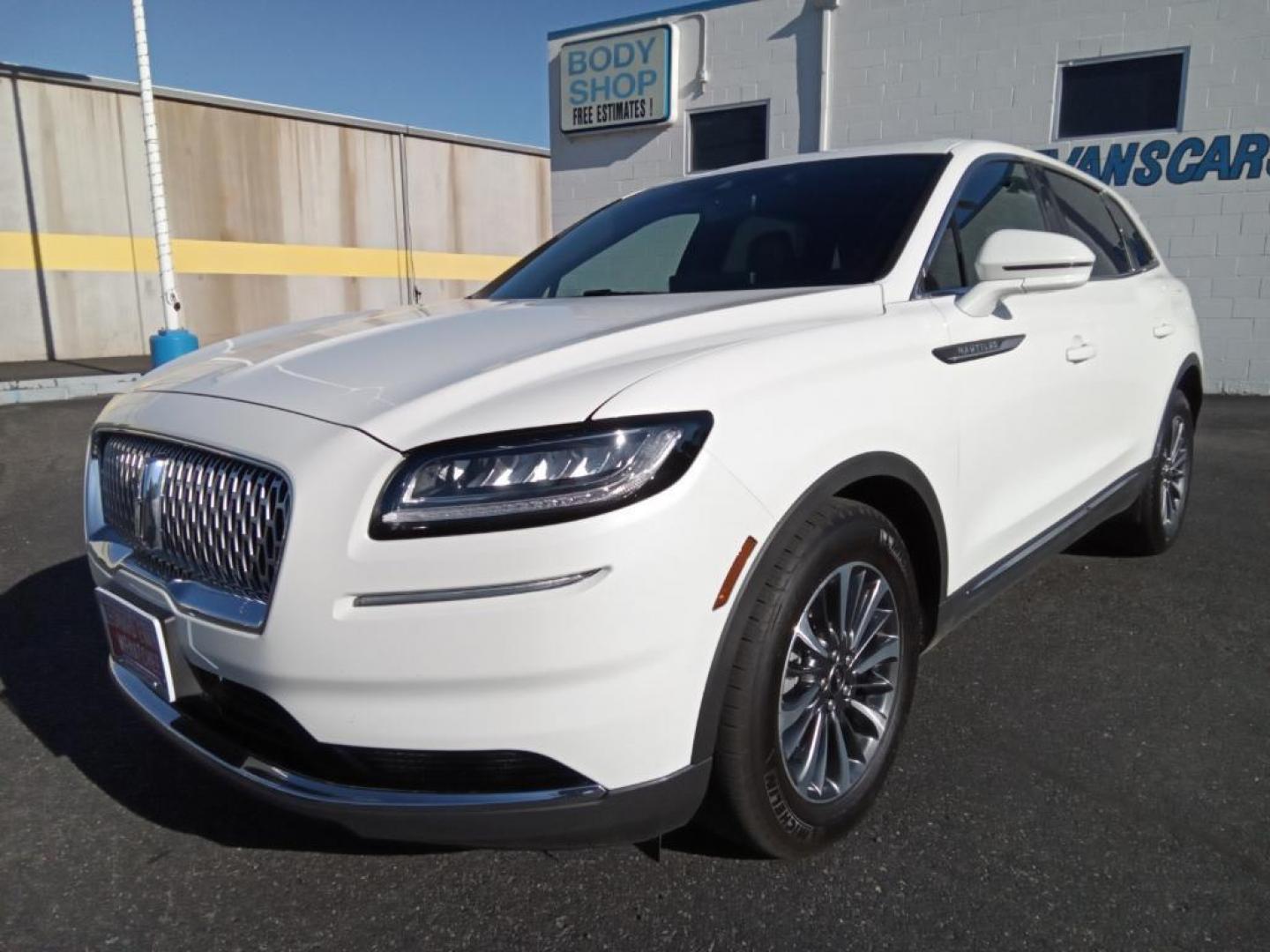 2023 Pristine White Metallic Tri-Coat Lincoln Nautilus Reserve AWD (2LMPJ8K95PB) with an 2.0L L4 DOHC 16V engine, 6A transmission, located at 6064 Gull Rd, Kalamazoo, MI, 49048, (269) 222-0088, 42.328388, -85.512924 - Protect the vehicle from unwanted accidents with a cutting edge backup camera system. Keep your hands warm all winter with a heated steering wheel in this mid-size suv . It offers Android Auto for seamless smartphone integration. This 2023 Lincoln Nautilus offers Apple CarPlay for seamless connect - Photo#2