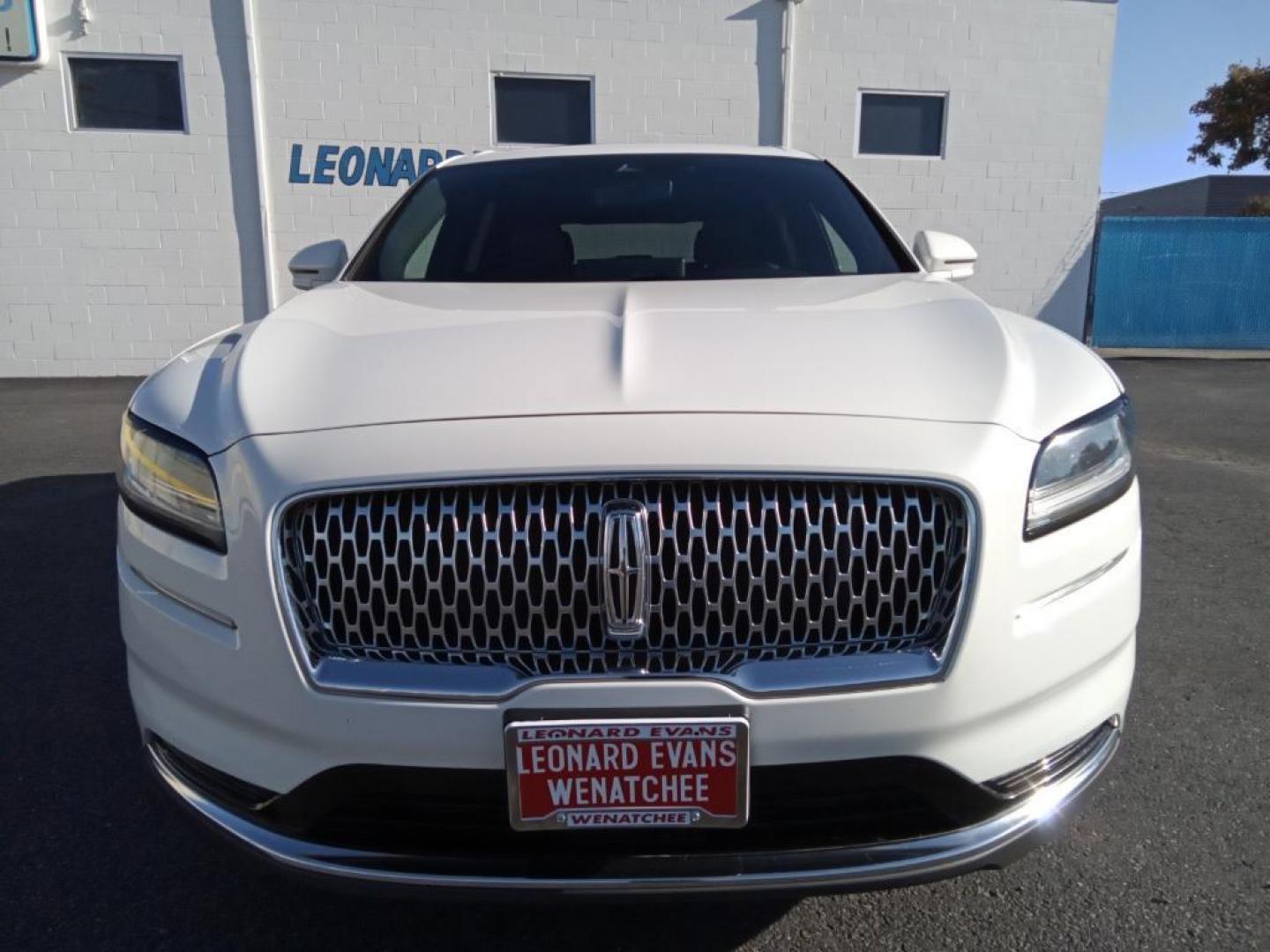 2023 Pristine White Metallic Tri-Coat Lincoln Nautilus Reserve AWD (2LMPJ8K95PB) with an 2.0L L4 DOHC 16V engine, 6A transmission, located at 6064 Gull Rd, Kalamazoo, MI, 49048, (269) 222-0088, 42.328388, -85.512924 - Protect the vehicle from unwanted accidents with a cutting edge backup camera system. Keep your hands warm all winter with a heated steering wheel in this mid-size suv . It offers Android Auto for seamless smartphone integration. This 2023 Lincoln Nautilus offers Apple CarPlay for seamless connect - Photo#3