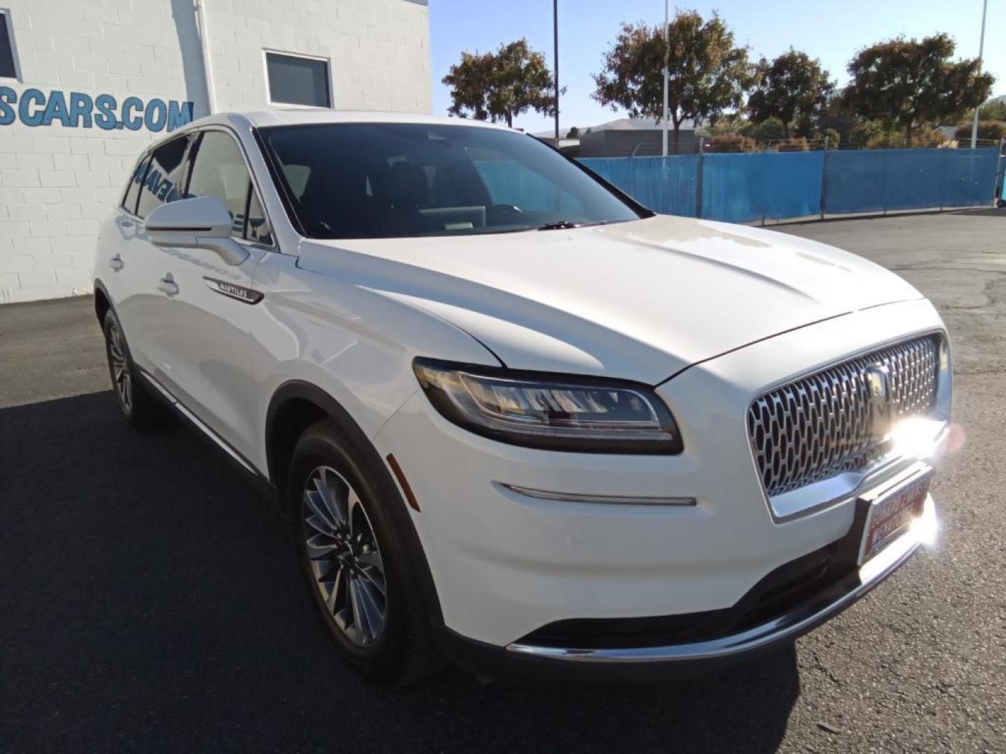 2023 Pristine White Metallic Tri-Coat Lincoln Nautilus Reserve AWD (2LMPJ8K95PB) with an 2.0L L4 DOHC 16V engine, 6A transmission, located at 6064 Gull Rd, Kalamazoo, MI, 49048, (269) 222-0088, 42.328388, -85.512924 - Protect the vehicle from unwanted accidents with a cutting edge backup camera system. Keep your hands warm all winter with a heated steering wheel in this mid-size suv . It offers Android Auto for seamless smartphone integration. This 2023 Lincoln Nautilus offers Apple CarPlay for seamless connect - Photo#4