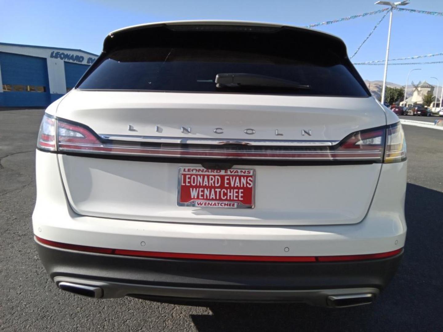 2023 Pristine White Metallic Tri-Coat Lincoln Nautilus Reserve AWD (2LMPJ8K95PB) with an 2.0L L4 DOHC 16V engine, 6A transmission, located at 6064 Gull Rd, Kalamazoo, MI, 49048, (269) 222-0088, 42.328388, -85.512924 - Protect the vehicle from unwanted accidents with a cutting edge backup camera system. Keep your hands warm all winter with a heated steering wheel in this mid-size suv . It offers Android Auto for seamless smartphone integration. This 2023 Lincoln Nautilus offers Apple CarPlay for seamless connect - Photo#6