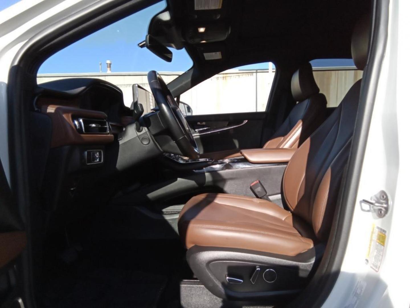 2023 Pristine White Metallic Tri-Coat Lincoln Nautilus Reserve AWD (2LMPJ8K95PB) with an 2.0L L4 DOHC 16V engine, 6A transmission, located at 6064 Gull Rd, Kalamazoo, MI, 49048, (269) 222-0088, 42.328388, -85.512924 - Protect the vehicle from unwanted accidents with a cutting edge backup camera system. Keep your hands warm all winter with a heated steering wheel in this mid-size suv . It offers Android Auto for seamless smartphone integration. This 2023 Lincoln Nautilus offers Apple CarPlay for seamless connect - Photo#8