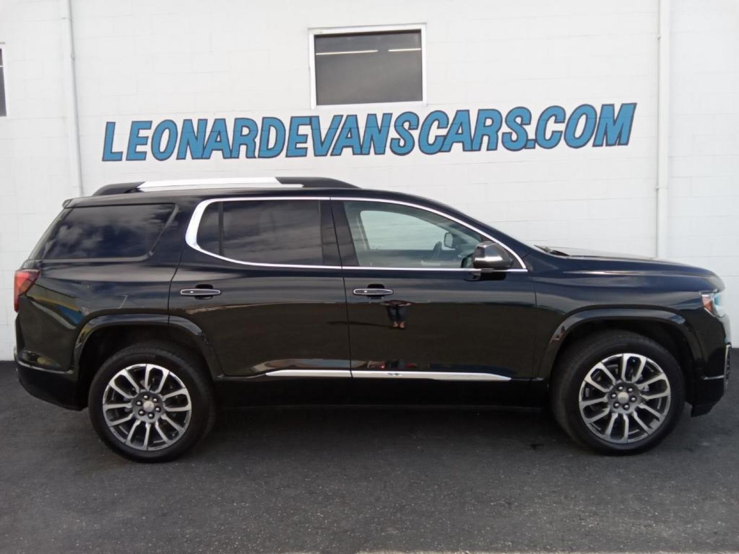 2021 Ebony Twilight Metallic GMC Acadia Denali AWD (1GKKNXLS9MZ) with an 3.6L V6 DOHC 24V engine, 6A transmission, located at 6064 Gull Rd, Kalamazoo, MI, 49048, (269) 222-0088, 42.328388, -85.512924 - The leather seats in it are a must for buyers looking for comfort, durability, and style. This vehicle offers Apple CarPlay for seamless connectivity. This mid-size suv's Lane Departure Warning keeps you safe by alerting you when you drift from your lane. Engulf yourself with the crystal clear sound - Photo#0