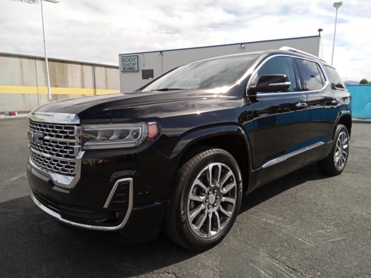 2021 Ebony Twilight Metallic GMC Acadia Denali AWD (1GKKNXLS9MZ) with an 3.6L V6 DOHC 24V engine, 6A transmission, located at 6064 Gull Rd, Kalamazoo, MI, 49048, (269) 222-0088, 42.328388, -85.512924 - The leather seats in it are a must for buyers looking for comfort, durability, and style. This vehicle offers Apple CarPlay for seamless connectivity. This mid-size suv's Lane Departure Warning keeps you safe by alerting you when you drift from your lane. Engulf yourself with the crystal clear sound - Photo#2