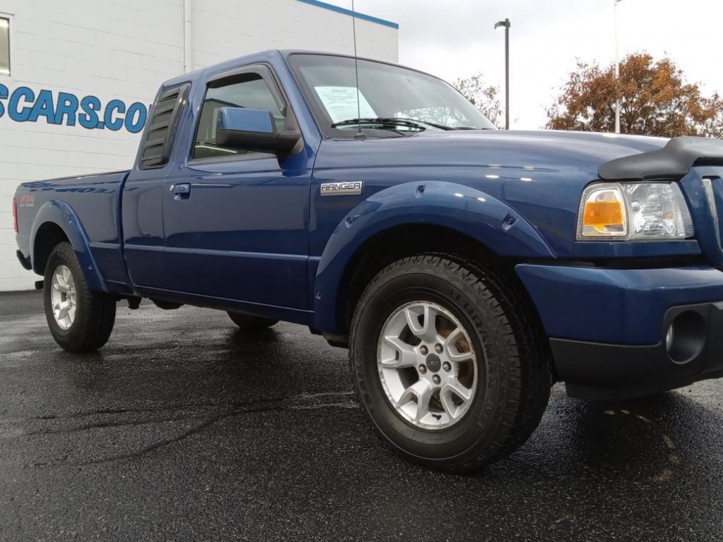 2011 BLUE Ford Ranger Sport SuperCab 4-Door 4WD (1FTLR4FE0BP) with an 4.0L V6 SOHC 12V engine, Automatic transmission, located at 6064 Gull Rd, Kalamazoo, MI, 49048, (269) 222-0088, 42.328388, -85.512924 - Photo#4