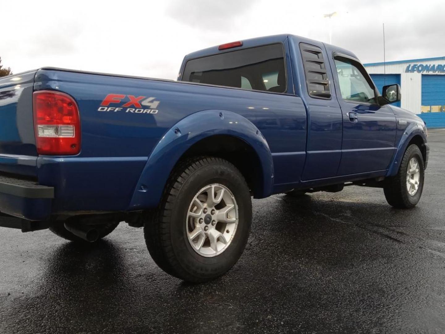 2011 BLUE Ford Ranger Sport SuperCab 4-Door 4WD (1FTLR4FE0BP) with an 4.0L V6 SOHC 12V engine, Automatic transmission, located at 6064 Gull Rd, Kalamazoo, MI, 49048, (269) 222-0088, 42.328388, -85.512924 - Photo#5