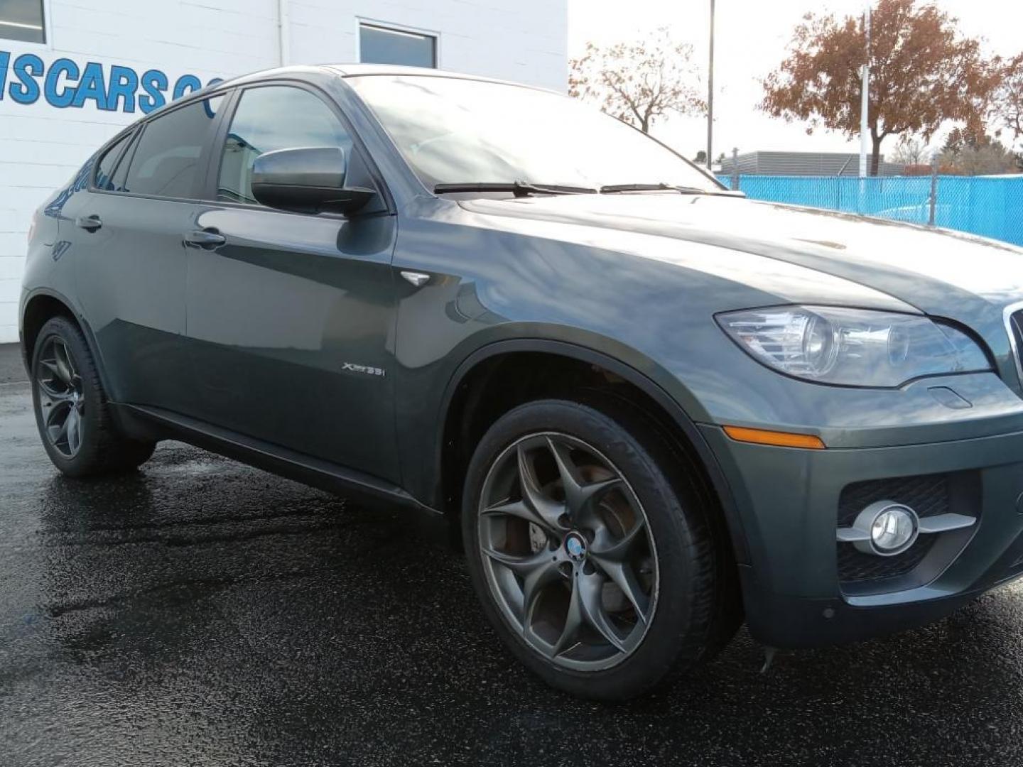 2008 Space Gray Metallic /Black BMW X6 xDrive35i (5UXFG43518L) with an 3.0L L6 DOHC 24V engine, 6-Speed Automatic Overdrive transmission, located at 6064 Gull Rd, Kalamazoo, MI, 49048, (269) 222-0088, 42.328388, -85.512924 - <b>Equipment</b><br>The state of the art park assist system will guide you easily into any spot. The leather seats in the BMW X6 are a must for buyers looking for comfort, durability, and style. This vehicle has a clean AutoCheck report. Night driving with HID Xenon headlamps is a breeze in this 200 - Photo#4