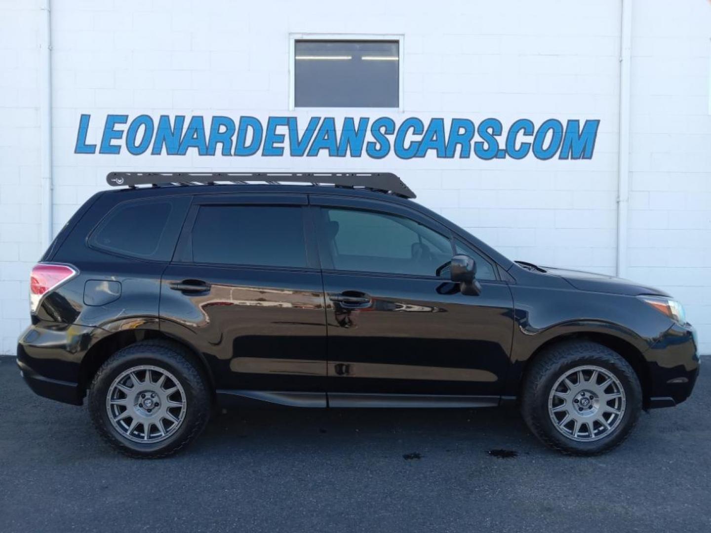 2017 Crystal Black Silica /Black Subaru Forester 2.5i Premium PZEV CVT (JF2SJABC9HH) with an 2.5L H4 SOHC 16V engine, CVT transmission, located at 6064 Gull Rd, Kalamazoo, MI, 49048, (269) 222-0088, 42.328388, -85.512924 - <b>Equipment</b><br>Bluetooth technology is built into this model, keeping your hands on the steering wheel and your focus on the road. See what's behind you with the back up camera on this Subaru Forester. Conquer any rainy, snowy, or icy road conditions this winter with the all wheel drive system - Photo#0