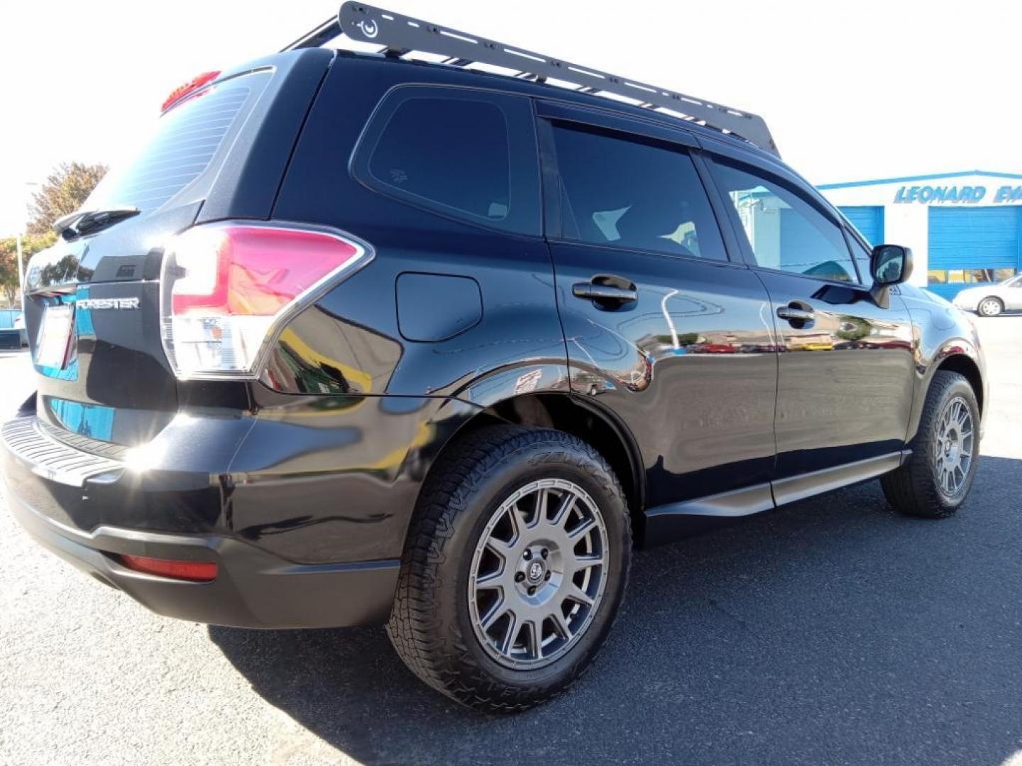 2017 Crystal Black Silica /Black Subaru Forester 2.5i Premium PZEV CVT (JF2SJABC9HH) with an 2.5L H4 SOHC 16V engine, CVT transmission, located at 6064 Gull Rd, Kalamazoo, MI, 49048, (269) 222-0088, 42.328388, -85.512924 - <b>Equipment</b><br>Bluetooth technology is built into this model, keeping your hands on the steering wheel and your focus on the road. See what's behind you with the back up camera on this Subaru Forester. Conquer any rainy, snowy, or icy road conditions this winter with the all wheel drive system - Photo#5