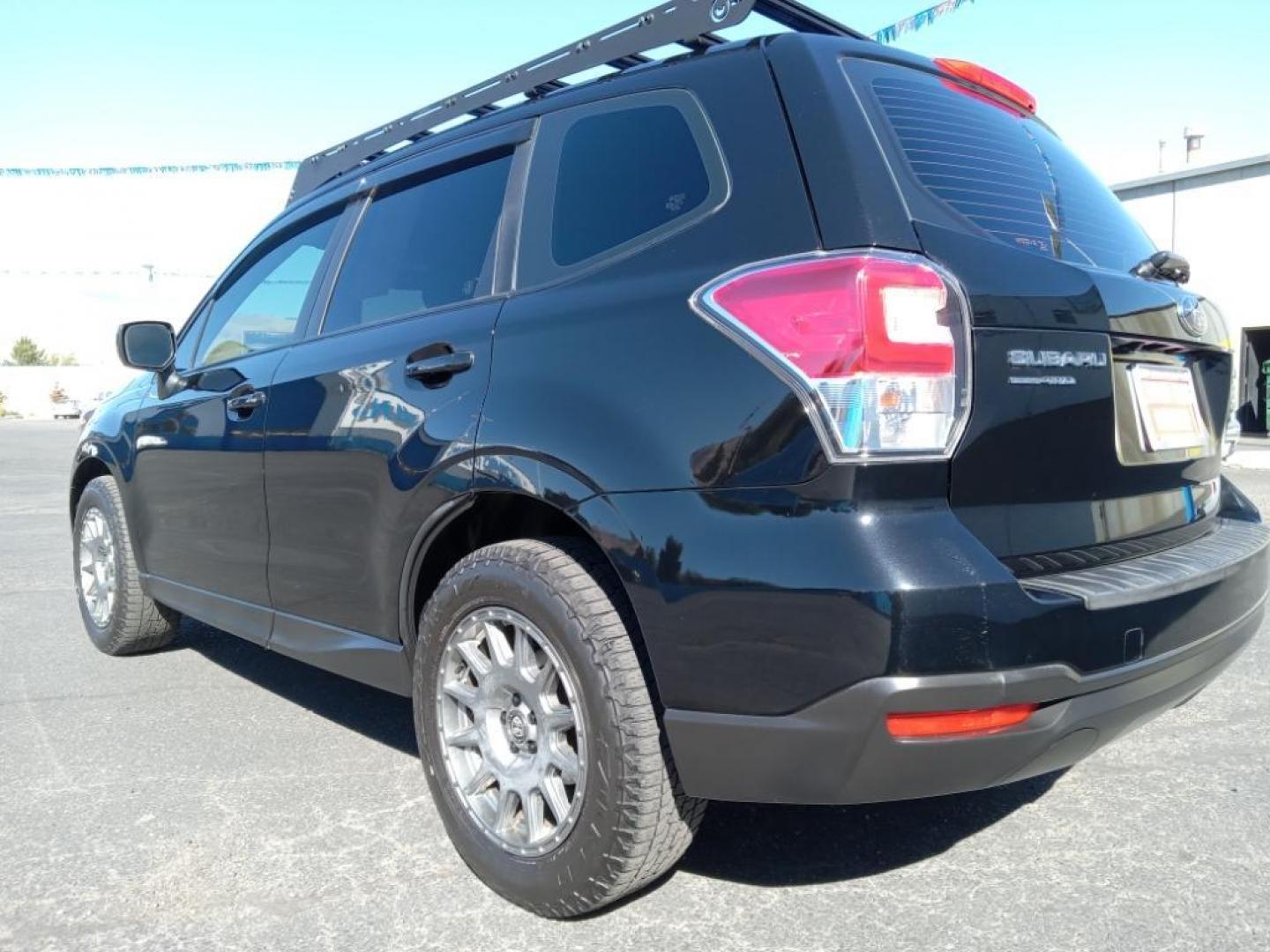 2017 Crystal Black Silica /Black Subaru Forester 2.5i Premium PZEV CVT (JF2SJABC9HH) with an 2.5L H4 SOHC 16V engine, CVT transmission, located at 6064 Gull Rd, Kalamazoo, MI, 49048, (269) 222-0088, 42.328388, -85.512924 - <b>Equipment</b><br>Bluetooth technology is built into this model, keeping your hands on the steering wheel and your focus on the road. See what's behind you with the back up camera on this Subaru Forester. Conquer any rainy, snowy, or icy road conditions this winter with the all wheel drive system - Photo#7