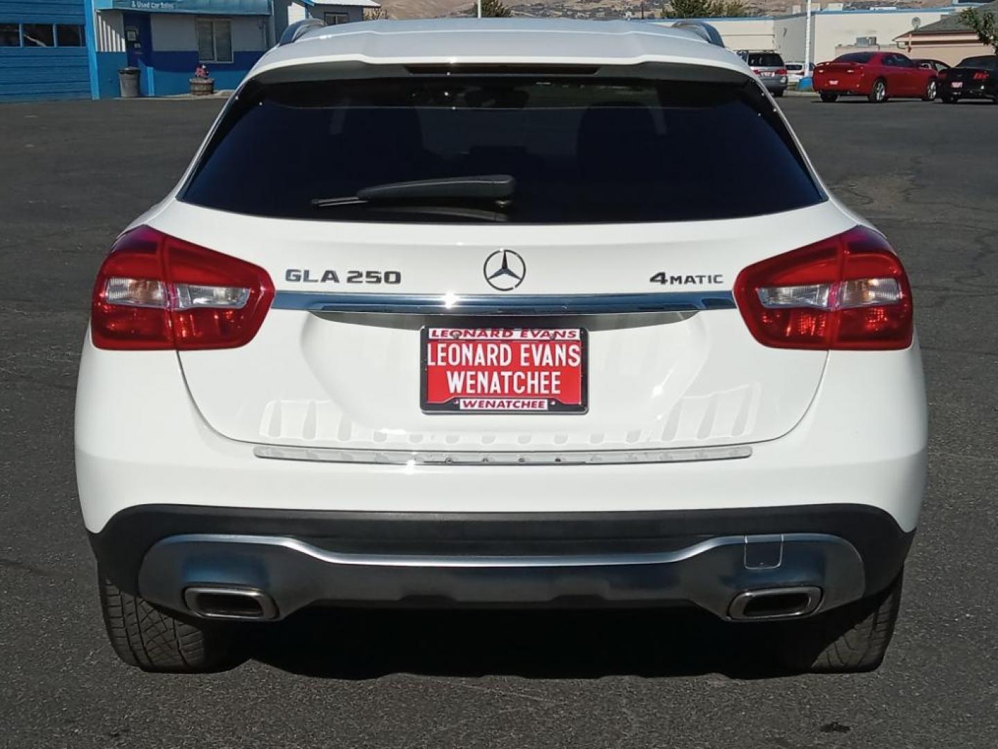 2020 Polar White /Black Mercedes-Benz GLA-Class GLA250 4MATIC (WDCTG4GB9LU) with an 2.0L L4 DOHC 16V TURBO engine, 7A transmission, located at 6064 Gull Rd, Kalamazoo, MI, 49048, (269) 222-0088, 42.328388, -85.512924 - <b>Equipment</b><br>See what's behind you with the back up camera on this small suv. This small suv has only one previous owner, verified by AutoCheck. It features a hands-free Bluetooth phone system. The leather seats in the Mercedes-Benz GLA are a must for buyers looking for comfort, durability, a - Photo#6