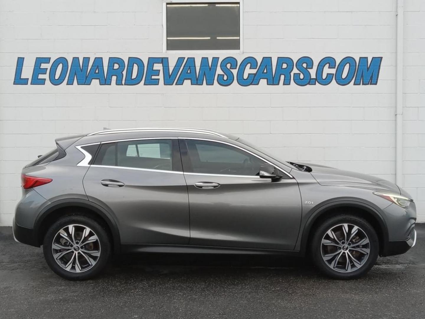 2017 Graphite Shadow /Graphite Infiniti QX30 Luxury AWD (SJKCH5CR6HA) with an 2.0L L4 DOHC 16V engine, 7A transmission, located at 6064 Gull Rd, Kalamazoo, MI, 49048, (269) 222-0088, 42.328388, -85.512924 - The leather seats in this model are a must for buyers looking for comfort, durability, and style. Protect the INFINITI QX30 from unwanted accidents with a cutting edge backup camera system. It features a hands-free Bluetooth phone system. This vehicle keeps you comfortable with Auto Climate. This 20 - Photo#0