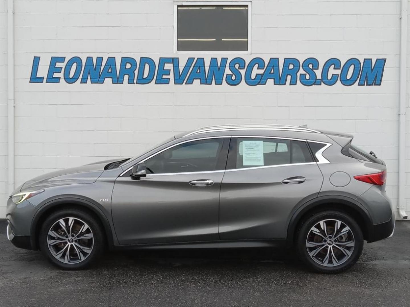 2017 Graphite Shadow /Graphite Infiniti QX30 Luxury AWD (SJKCH5CR6HA) with an 2.0L L4 DOHC 16V engine, 7A transmission, located at 6064 Gull Rd, Kalamazoo, MI, 49048, (269) 222-0088, 42.328388, -85.512924 - The leather seats in this model are a must for buyers looking for comfort, durability, and style. Protect the INFINITI QX30 from unwanted accidents with a cutting edge backup camera system. It features a hands-free Bluetooth phone system. This vehicle keeps you comfortable with Auto Climate. This 20 - Photo#1