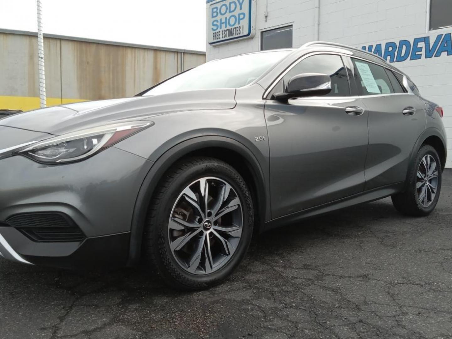 2017 Graphite Shadow /Graphite Infiniti QX30 Luxury AWD (SJKCH5CR6HA) with an 2.0L L4 DOHC 16V engine, 7A transmission, located at 6064 Gull Rd, Kalamazoo, MI, 49048, (269) 222-0088, 42.328388, -85.512924 - The leather seats in this model are a must for buyers looking for comfort, durability, and style. Protect the INFINITI QX30 from unwanted accidents with a cutting edge backup camera system. It features a hands-free Bluetooth phone system. This vehicle keeps you comfortable with Auto Climate. This 20 - Photo#2