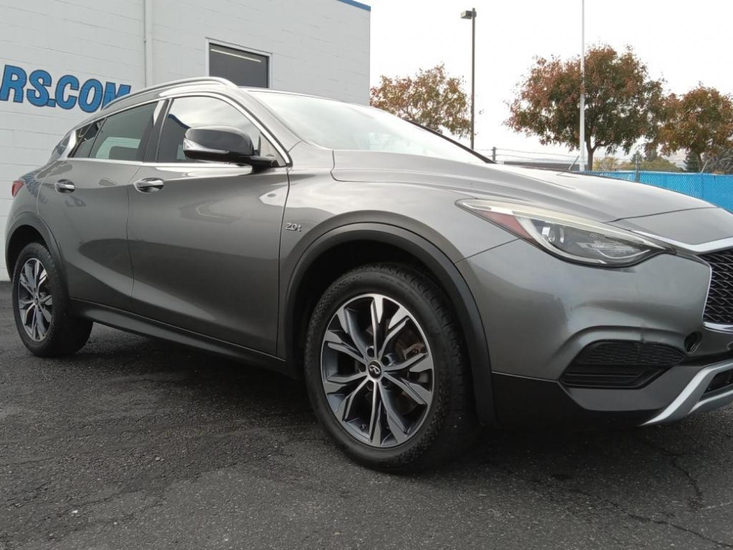 2017 Graphite Shadow /Graphite Infiniti QX30 Luxury AWD (SJKCH5CR6HA) with an 2.0L L4 DOHC 16V engine, 7A transmission, located at 6064 Gull Rd, Kalamazoo, MI, 49048, (269) 222-0088, 42.328388, -85.512924 - The leather seats in this model are a must for buyers looking for comfort, durability, and style. Protect the INFINITI QX30 from unwanted accidents with a cutting edge backup camera system. It features a hands-free Bluetooth phone system. This vehicle keeps you comfortable with Auto Climate. This 20 - Photo#4