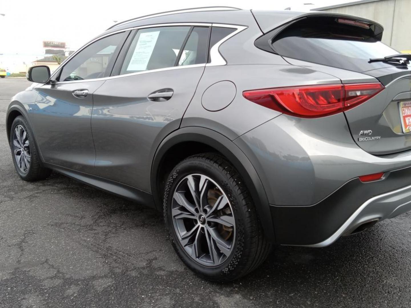 2017 Graphite Shadow /Graphite Infiniti QX30 Luxury AWD (SJKCH5CR6HA) with an 2.0L L4 DOHC 16V engine, 7A transmission, located at 6064 Gull Rd, Kalamazoo, MI, 49048, (269) 222-0088, 42.328388, -85.512924 - The leather seats in this model are a must for buyers looking for comfort, durability, and style. Protect the INFINITI QX30 from unwanted accidents with a cutting edge backup camera system. It features a hands-free Bluetooth phone system. This vehicle keeps you comfortable with Auto Climate. This 20 - Photo#7