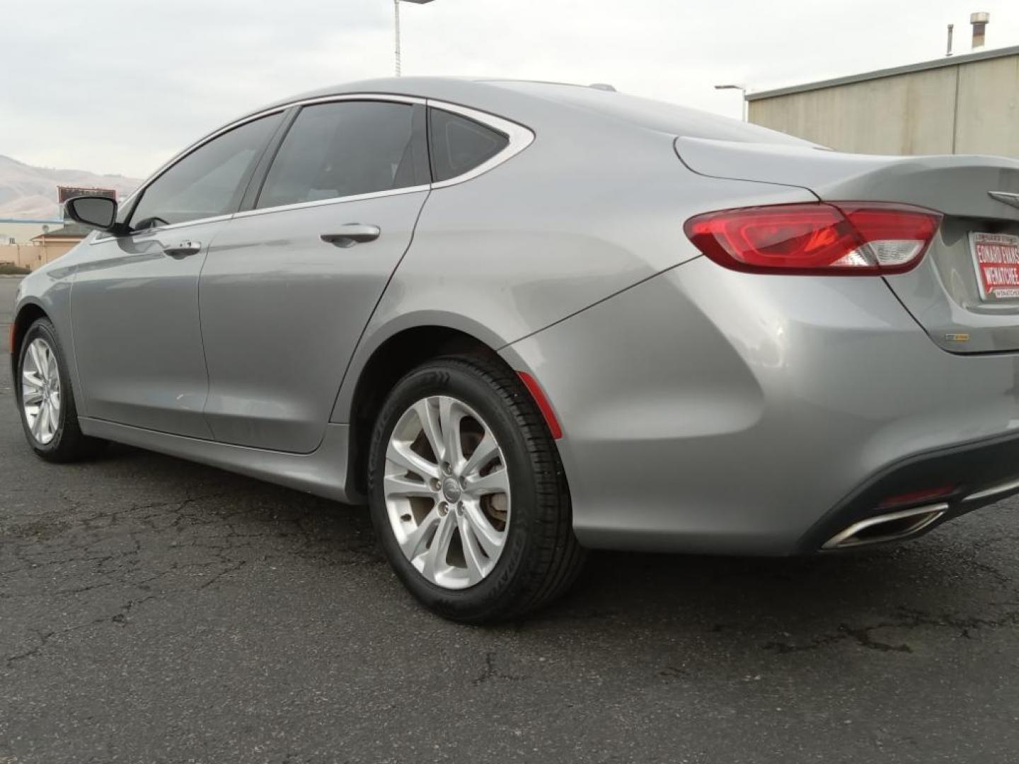 2016 Billet Silver Metallic Clearcoat Chrysler 200 Limited (1C3CCCAG8GN) with an 3.6L V6 DOHC 24V FFV engine, 9A transmission, located at 6064 Gull Rd, Kalamazoo, MI, 49048, (269) 222-0088, 42.328388, -85.512924 - Protect the vehicle from unwanted accidents with a cutting edge backup camera system. The Chrysler 200 features a hands-free Bluetooth phone system. It has a clean AutoCheck report, ensuring its impeccable vehicle history. The vehicle has only one previous owner, verified by AutoCheck. This 2016 Chr - Photo#7