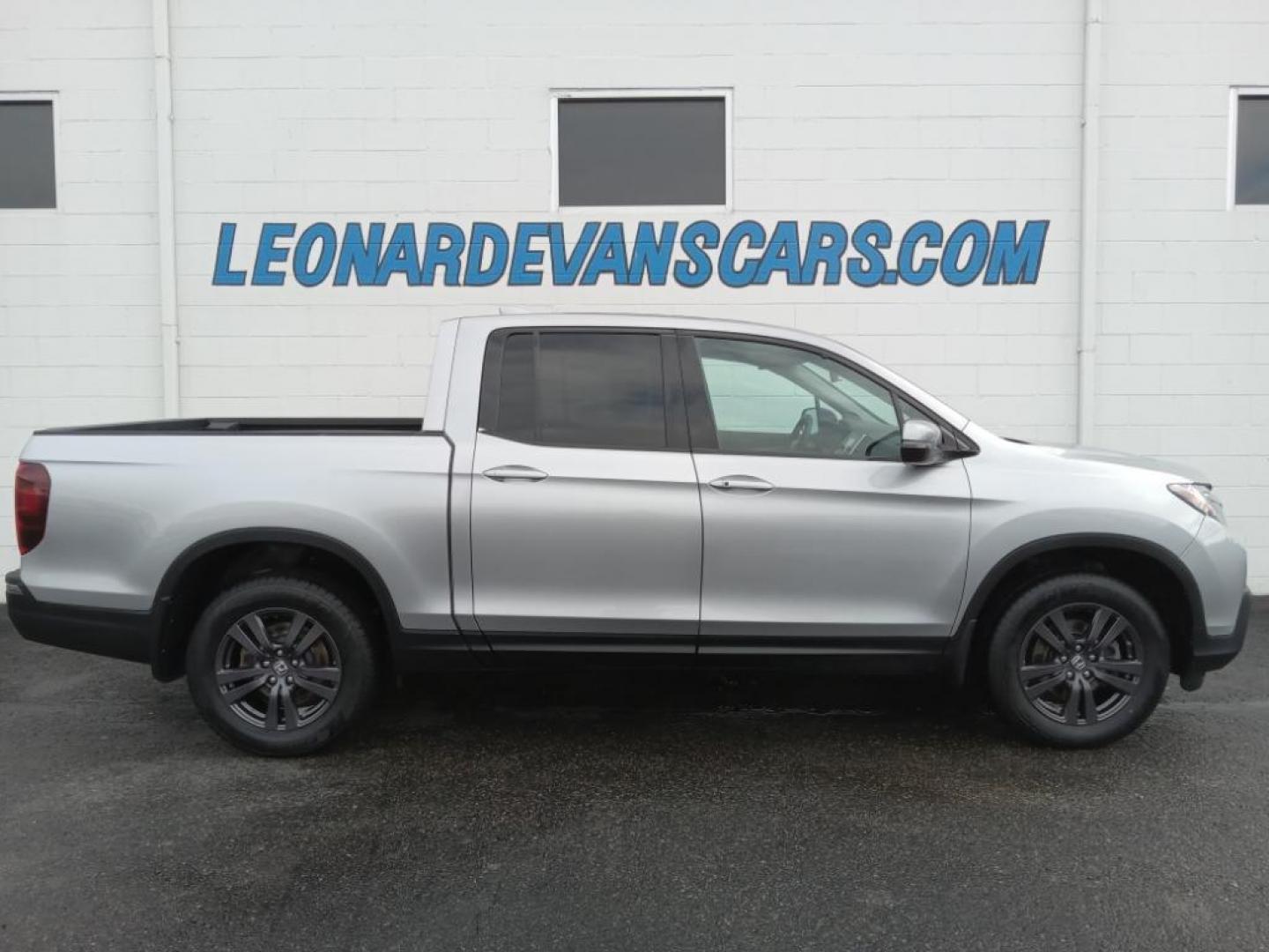 2019 Lunar Silver Metallic /Black Honda Ridgeline Sport AWD (5FPYK3F18KB) with an 3.5L V6 SOHC 24V engine, 6A transmission, located at 6064 Gull Rd, Kalamazoo, MI, 49048, (269) 222-0088, 42.328388, -85.512924 - This model keeps you comfortable with Auto Climate. Protect the Honda Ridgeline from unwanted accidents with a cutting edge backup camera system. It's AutoCheck: 1 owner, assurance of single-owner history for peace of mind. Bluetooth technology is built into it, keeping your hands on the steering wh - Photo#0