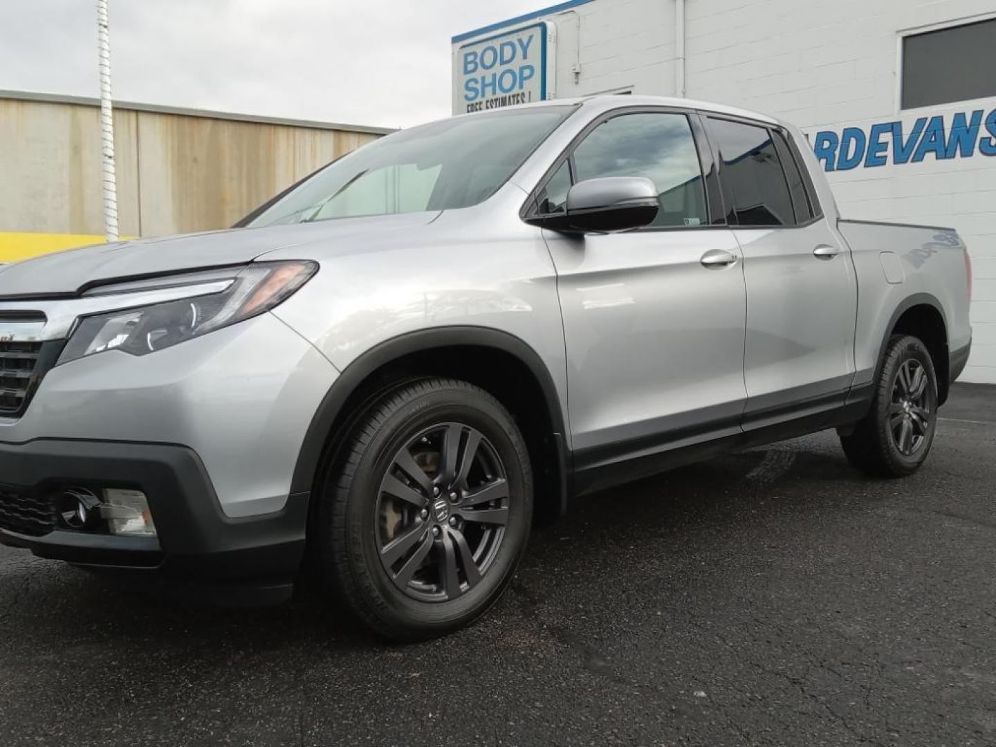 2019 Lunar Silver Metallic /Black Honda Ridgeline Sport AWD (5FPYK3F18KB) with an 3.5L V6 SOHC 24V engine, 6A transmission, located at 6064 Gull Rd, Kalamazoo, MI, 49048, (269) 222-0088, 42.328388, -85.512924 - This model keeps you comfortable with Auto Climate. Protect the Honda Ridgeline from unwanted accidents with a cutting edge backup camera system. It's AutoCheck: 1 owner, assurance of single-owner history for peace of mind. Bluetooth technology is built into it, keeping your hands on the steering wh - Photo#2