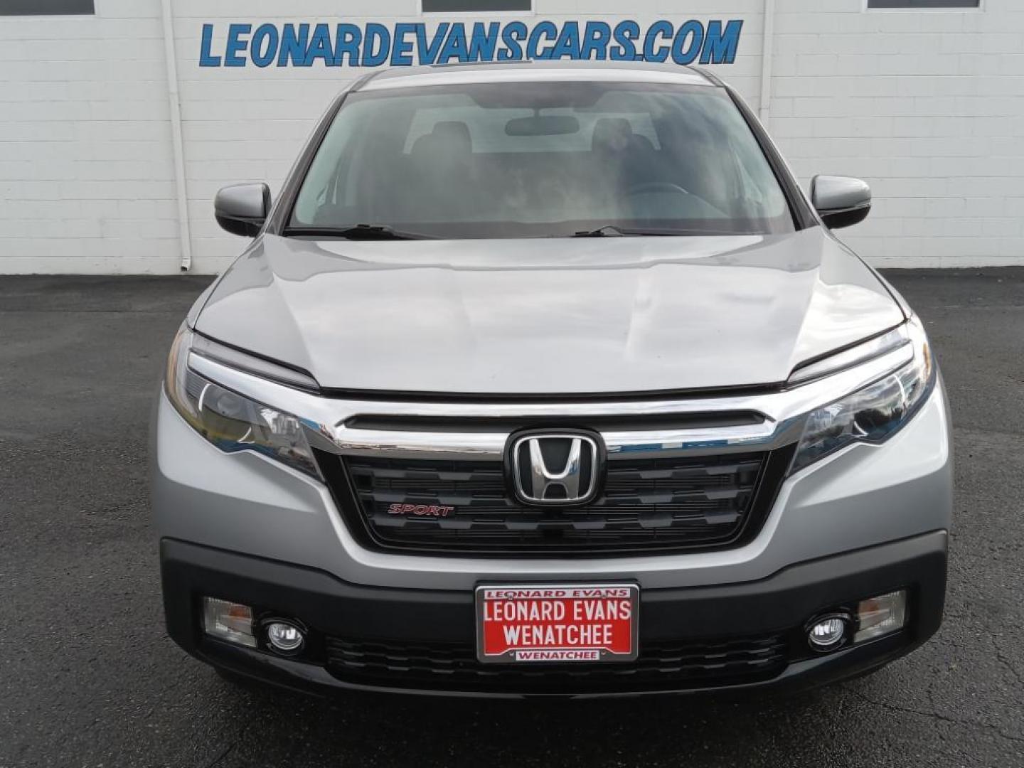 2019 Lunar Silver Metallic /Black Honda Ridgeline Sport AWD (5FPYK3F18KB) with an 3.5L V6 SOHC 24V engine, 6A transmission, located at 6064 Gull Rd, Kalamazoo, MI, 49048, (269) 222-0088, 42.328388, -85.512924 - This model keeps you comfortable with Auto Climate. Protect the Honda Ridgeline from unwanted accidents with a cutting edge backup camera system. It's AutoCheck: 1 owner, assurance of single-owner history for peace of mind. Bluetooth technology is built into it, keeping your hands on the steering wh - Photo#3