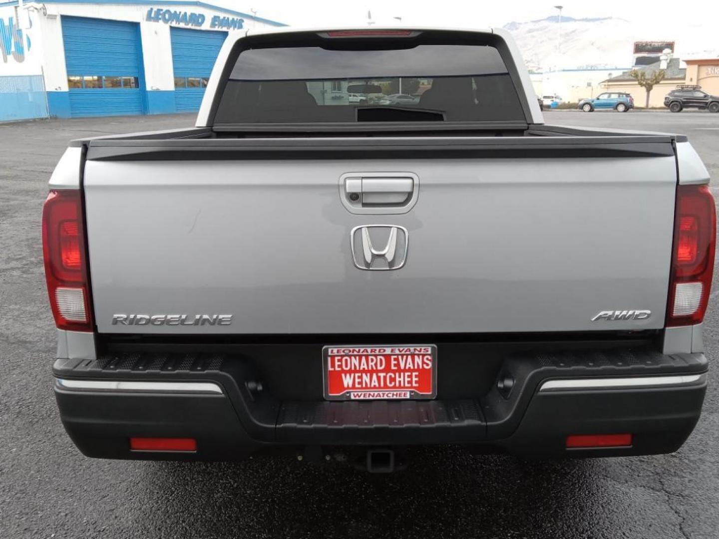 2019 Lunar Silver Metallic /Black Honda Ridgeline Sport AWD (5FPYK3F18KB) with an 3.5L V6 SOHC 24V engine, 6A transmission, located at 6064 Gull Rd, Kalamazoo, MI, 49048, (269) 222-0088, 42.328388, -85.512924 - This model keeps you comfortable with Auto Climate. Protect the Honda Ridgeline from unwanted accidents with a cutting edge backup camera system. It's AutoCheck: 1 owner, assurance of single-owner history for peace of mind. Bluetooth technology is built into it, keeping your hands on the steering wh - Photo#6