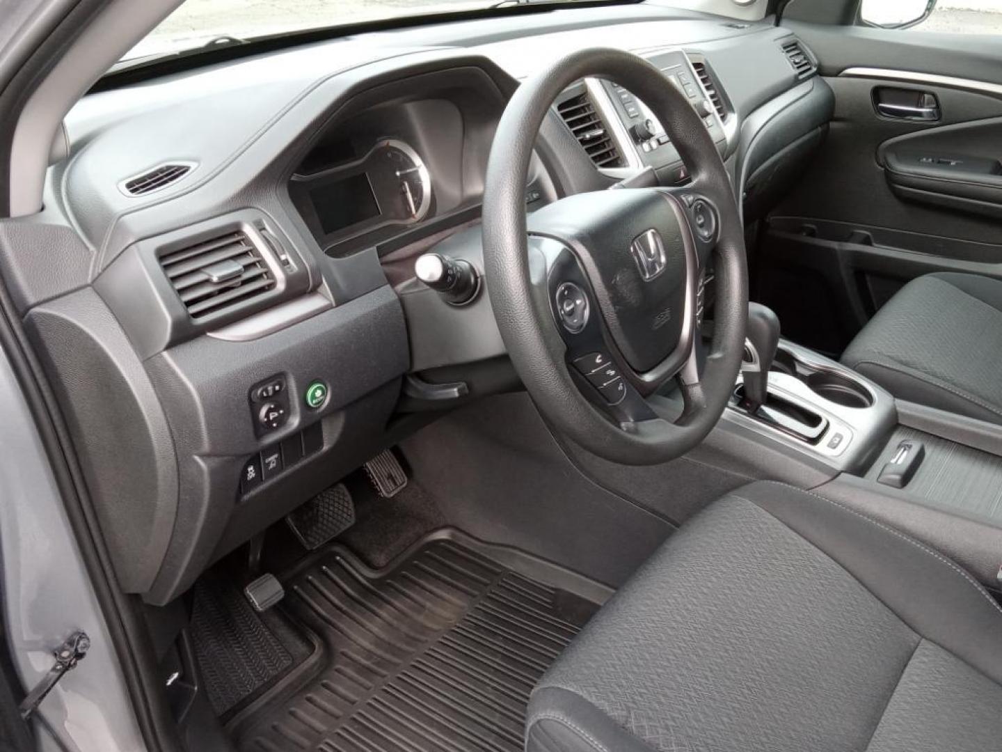 2019 Lunar Silver Metallic /Black Honda Ridgeline Sport AWD (5FPYK3F18KB) with an 3.5L V6 SOHC 24V engine, 6A transmission, located at 6064 Gull Rd, Kalamazoo, MI, 49048, (269) 222-0088, 42.328388, -85.512924 - This model keeps you comfortable with Auto Climate. Protect the Honda Ridgeline from unwanted accidents with a cutting edge backup camera system. It's AutoCheck: 1 owner, assurance of single-owner history for peace of mind. Bluetooth technology is built into it, keeping your hands on the steering wh - Photo#8