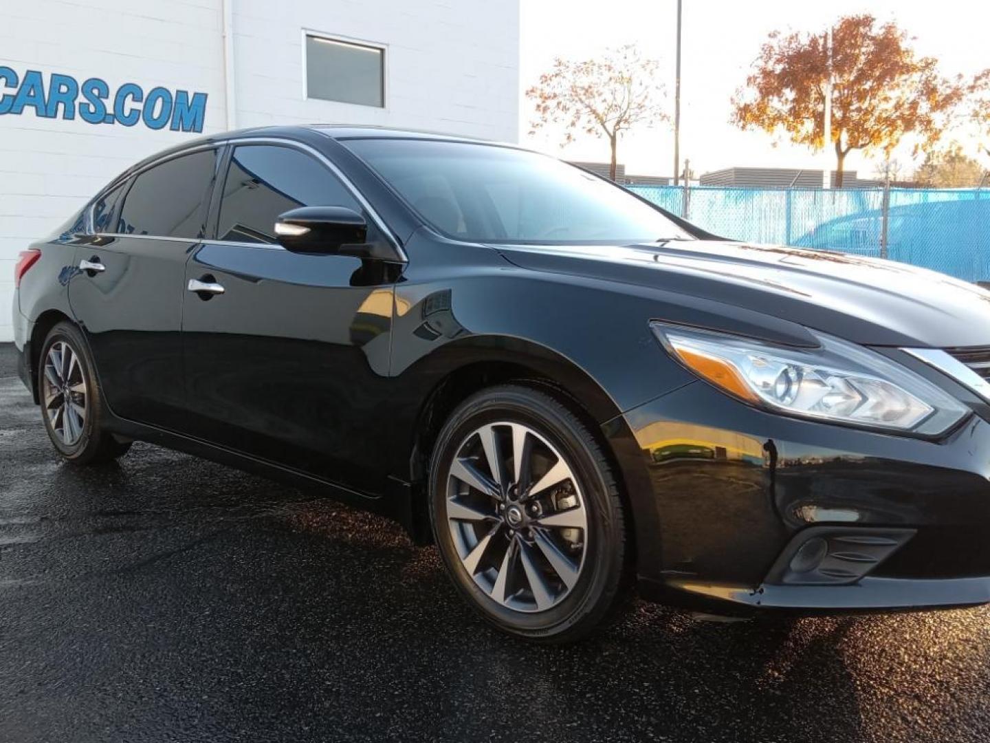 2016 Super Black /Beige Nissan Altima 2.5 SL (1N4AL3AP0GC) with an 2.5L L4 DOHC 16V engine, CVT transmission, located at 6064 Gull Rd, Kalamazoo, MI, 49048, (269) 222-0088, 42.328388, -85.512924 - <b>Equipment</b><br>The Nissan Altima is pure luxury with a heated steering wheel. See what's behind you with the back up camera on it. Bluetooth technology is built into this unit, keeping your hands on the steering wheel and your focus on the road. This unit has a clean AutoCheck report. This 2016 - Photo#4