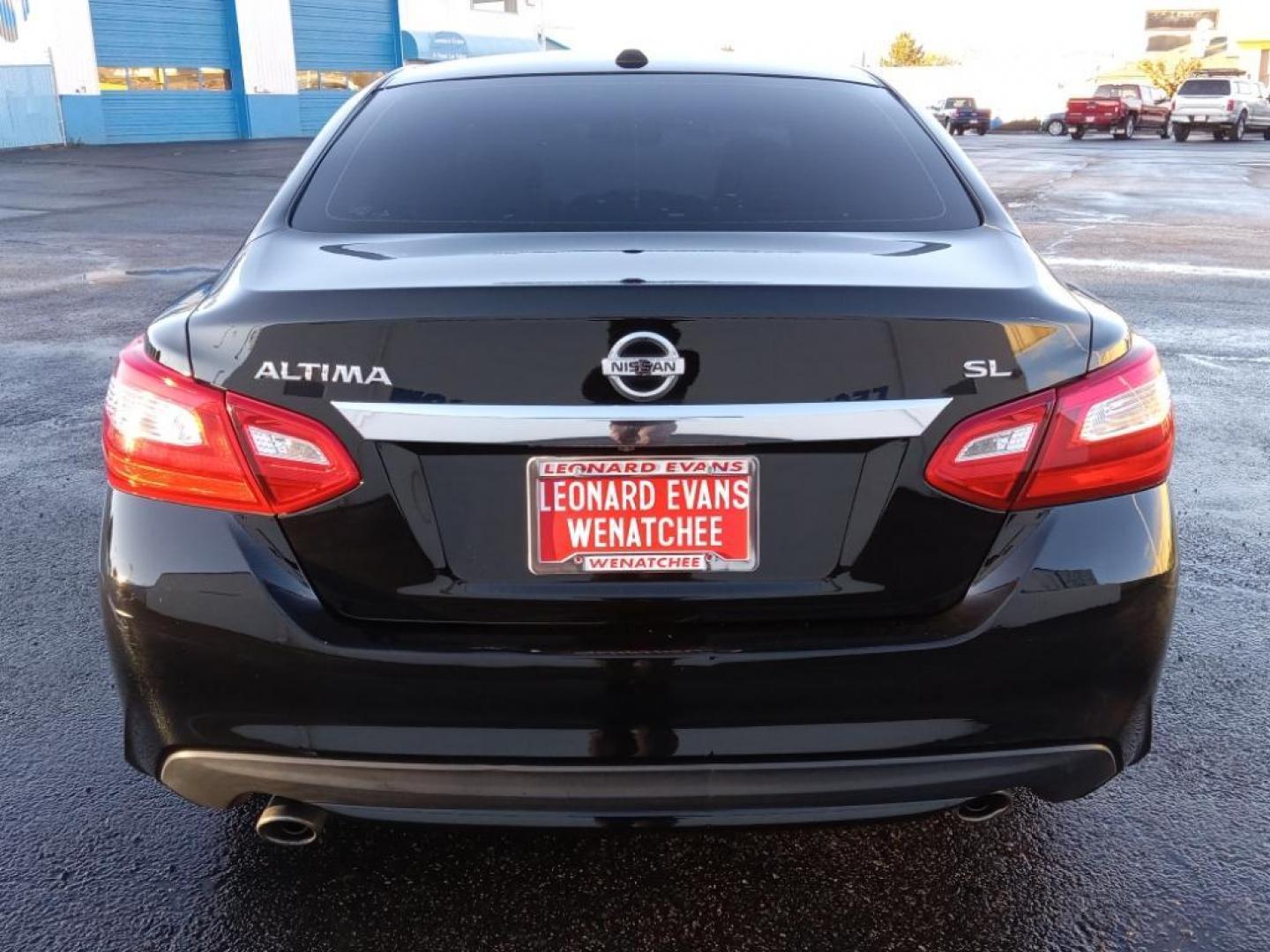 2016 Super Black /Beige Nissan Altima 2.5 SL (1N4AL3AP0GC) with an 2.5L L4 DOHC 16V engine, CVT transmission, located at 6064 Gull Rd, Kalamazoo, MI, 49048, (269) 222-0088, 42.328388, -85.512924 - <b>Equipment</b><br>The Nissan Altima is pure luxury with a heated steering wheel. See what's behind you with the back up camera on it. Bluetooth technology is built into this unit, keeping your hands on the steering wheel and your focus on the road. This unit has a clean AutoCheck report. This 2016 - Photo#6