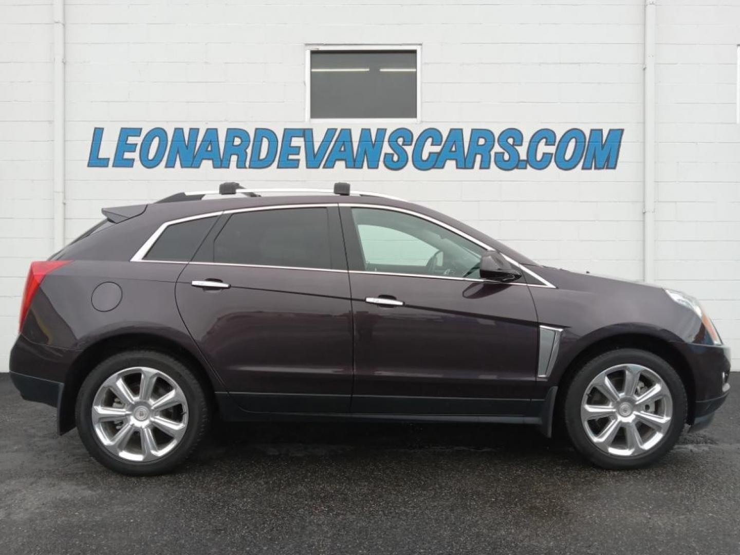 2015 Majestic Plum Metallic /Ebony/Ebony Accents Cadillac SRX Performance Collection AWD (3GYFNFE32FS) with an 3.6L V6 DOHC 24V FFV engine, 6-Speed Automatic transmission, located at 6064 Gull Rd, Kalamazoo, MI, 49048, (269) 222-0088, 42.328388, -85.512924 - <b>Equipment</b><br>It's AutoCheck: 1 owner, assurance of single-owner history for peace of mind. This mid-size suv has a clean AutoCheck report, ensuring its impeccable vehicle history. Night driving with HID Xenon headlamps is a breeze in this vehicle. Never get into a cold vehicle again with the - Photo#0