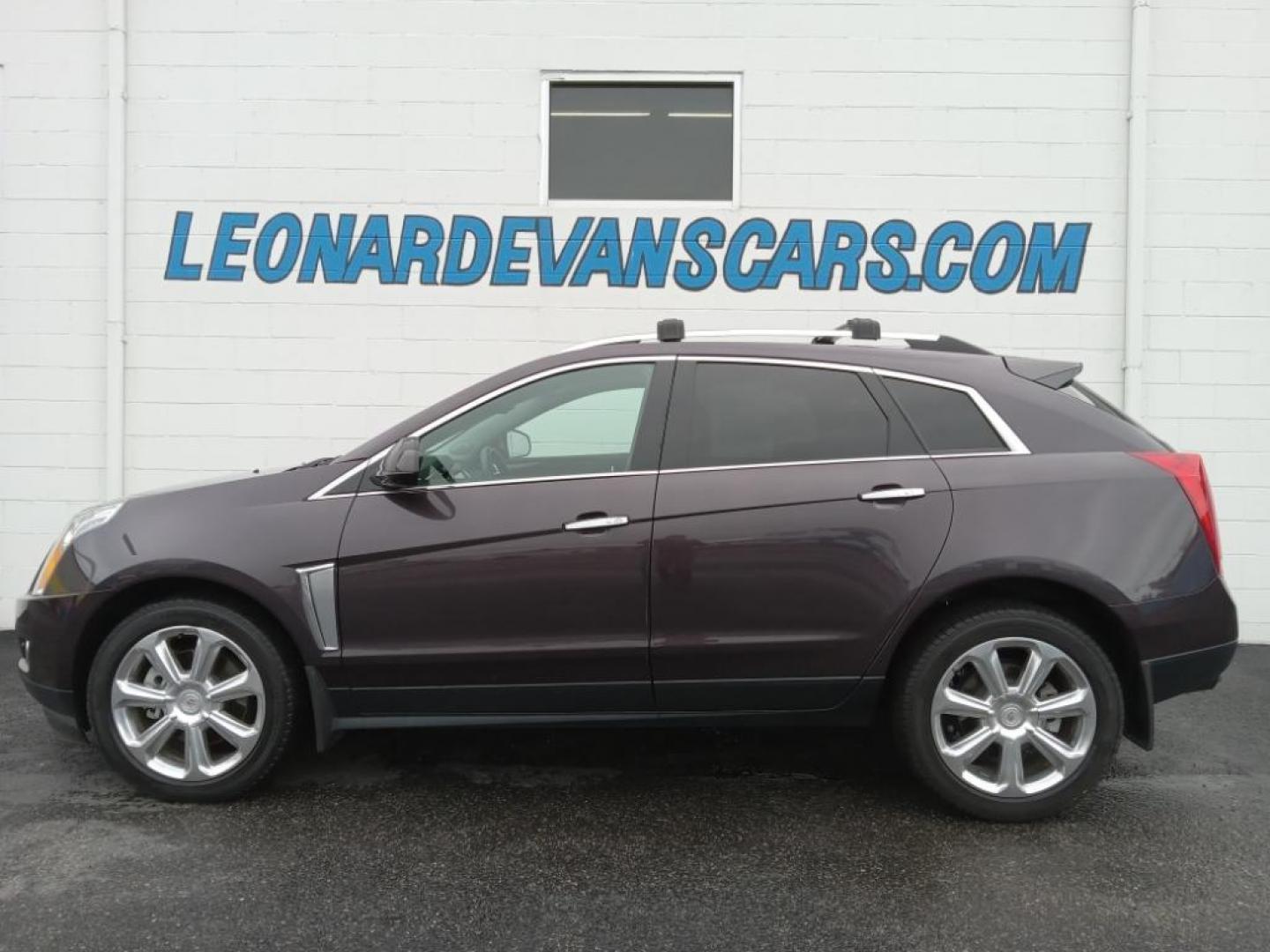 2015 Majestic Plum Metallic /Ebony/Ebony Accents Cadillac SRX Performance Collection AWD (3GYFNFE32FS) with an 3.6L V6 DOHC 24V FFV engine, 6-Speed Automatic transmission, located at 6064 Gull Rd, Kalamazoo, MI, 49048, (269) 222-0088, 42.328388, -85.512924 - <b>Equipment</b><br>It's AutoCheck: 1 owner, assurance of single-owner history for peace of mind. This mid-size suv has a clean AutoCheck report, ensuring its impeccable vehicle history. Night driving with HID Xenon headlamps is a breeze in this vehicle. Never get into a cold vehicle again with the - Photo#1