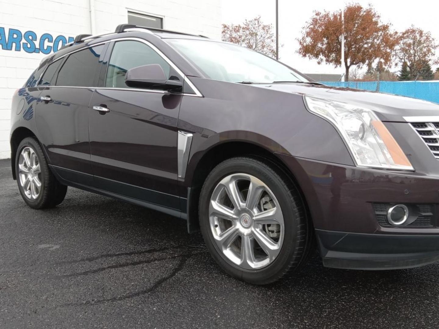 2015 Majestic Plum Metallic /Ebony/Ebony Accents Cadillac SRX Performance Collection AWD (3GYFNFE32FS) with an 3.6L V6 DOHC 24V FFV engine, 6-Speed Automatic transmission, located at 6064 Gull Rd, Kalamazoo, MI, 49048, (269) 222-0088, 42.328388, -85.512924 - <b>Equipment</b><br>It's AutoCheck: 1 owner, assurance of single-owner history for peace of mind. This mid-size suv has a clean AutoCheck report, ensuring its impeccable vehicle history. Night driving with HID Xenon headlamps is a breeze in this vehicle. Never get into a cold vehicle again with the - Photo#4