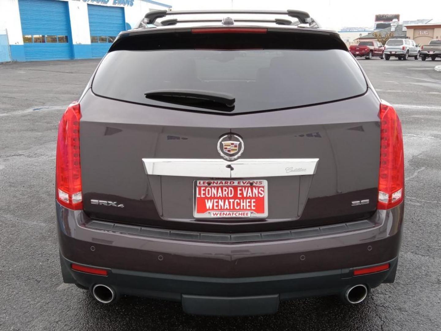 2015 Majestic Plum Metallic /Ebony/Ebony Accents Cadillac SRX Performance Collection AWD (3GYFNFE32FS) with an 3.6L V6 DOHC 24V FFV engine, 6-Speed Automatic transmission, located at 6064 Gull Rd, Kalamazoo, MI, 49048, (269) 222-0088, 42.328388, -85.512924 - <b>Equipment</b><br>It's AutoCheck: 1 owner, assurance of single-owner history for peace of mind. This mid-size suv has a clean AutoCheck report, ensuring its impeccable vehicle history. Night driving with HID Xenon headlamps is a breeze in this vehicle. Never get into a cold vehicle again with the - Photo#6