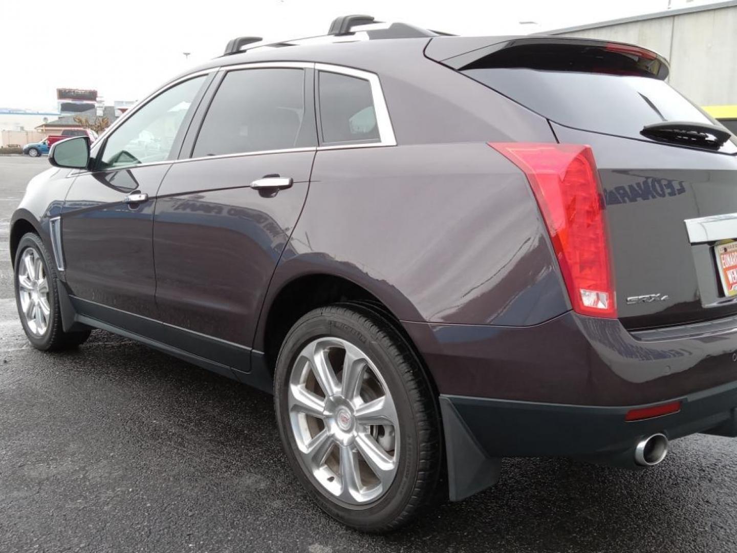 2015 Majestic Plum Metallic /Ebony/Ebony Accents Cadillac SRX Performance Collection AWD (3GYFNFE32FS) with an 3.6L V6 DOHC 24V FFV engine, 6-Speed Automatic transmission, located at 6064 Gull Rd, Kalamazoo, MI, 49048, (269) 222-0088, 42.328388, -85.512924 - <b>Equipment</b><br>It's AutoCheck: 1 owner, assurance of single-owner history for peace of mind. This mid-size suv has a clean AutoCheck report, ensuring its impeccable vehicle history. Night driving with HID Xenon headlamps is a breeze in this vehicle. Never get into a cold vehicle again with the - Photo#7