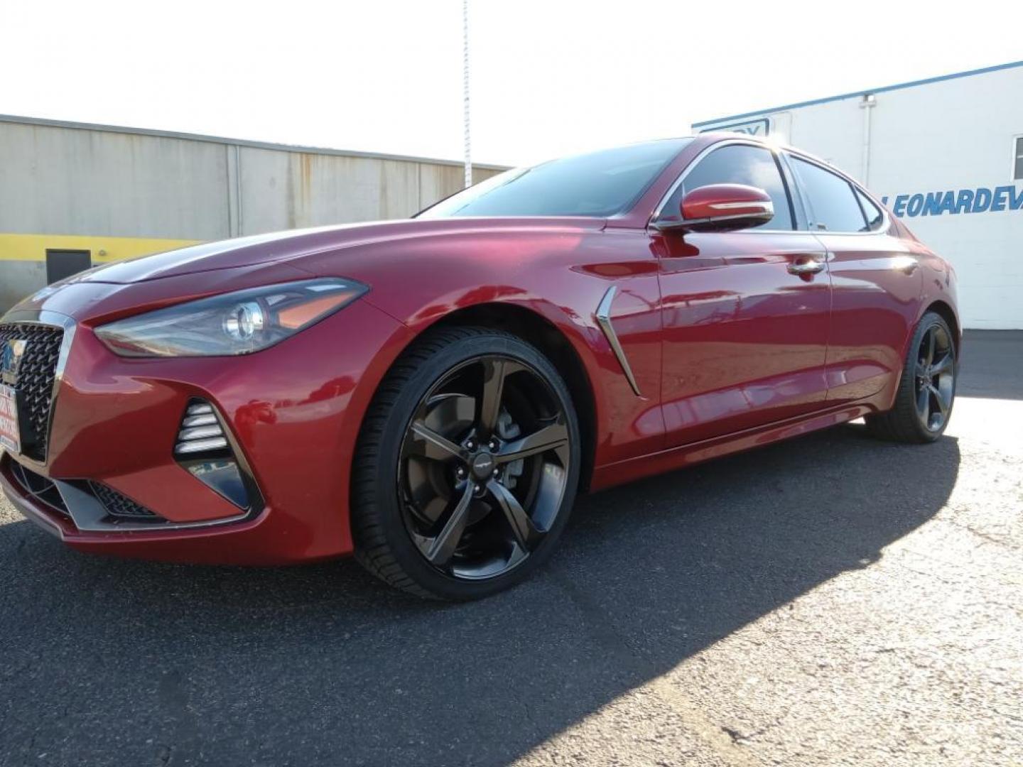 2020 Havana Red Genesis G70 2.0T Advanced (KMTG44LAXLU) with an 2.0L L4 DOHC 16V TURBO engine, 8A transmission, located at 6064 Gull Rd, Kalamazoo, MI, 49048, (269) 222-0088, 42.328388, -85.512924 - It has a clean CARFAX vehicle history report. It has a 2.0 liter 4 Cylinder Engine high output engine. This Genesis G70 features a HomeLink System. This 2020 Genesis G70 excites both driver and bystanders with a polished red exterior with racy lines. This vehicle is equipped with all wheel drive. T - Photo#2