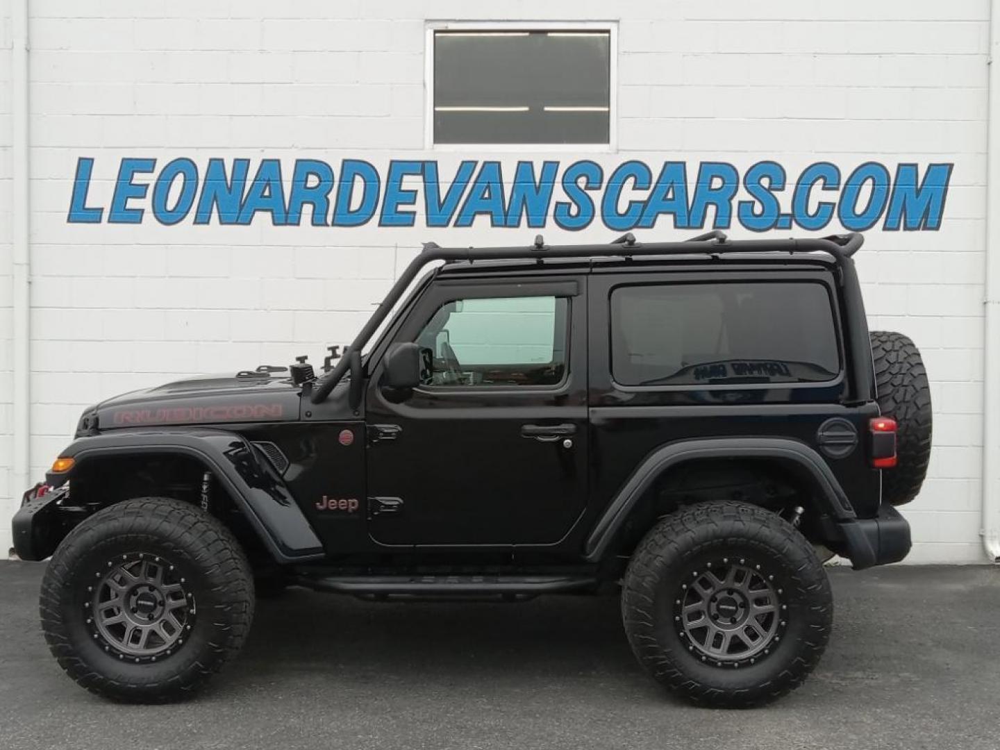 2020 BLACK Jeep Wrangler Rubicon (1C4HJXCG9LW) with an 3.6L V6 DOHC 24V FFV engine, 6A transmission, located at 6064 Gull Rd, Kalamazoo, MI, 49048, (269) 222-0088, 42.328388, -85.512924 - Protect this model from unwanted accidents with a cutting edge backup camera system. Bluetooth technology is built into this Jeep Wrangler, keeping your hands on the steering wheel and your focus on the road. This mid-size suv offers Apple CarPlay for seamless connectivity. This Jeep Wrangler has a - Photo#1