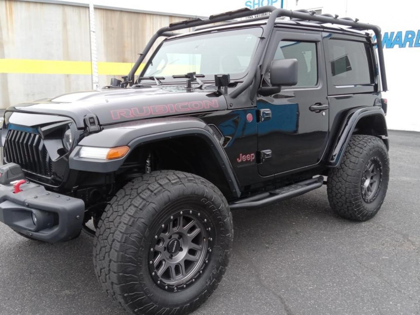 2020 BLACK Jeep Wrangler Rubicon (1C4HJXCG9LW) with an 3.6L V6 DOHC 24V FFV engine, 6A transmission, located at 6064 Gull Rd, Kalamazoo, MI, 49048, (269) 222-0088, 42.328388, -85.512924 - Protect this model from unwanted accidents with a cutting edge backup camera system. Bluetooth technology is built into this Jeep Wrangler, keeping your hands on the steering wheel and your focus on the road. This mid-size suv offers Apple CarPlay for seamless connectivity. This Jeep Wrangler has a - Photo#2