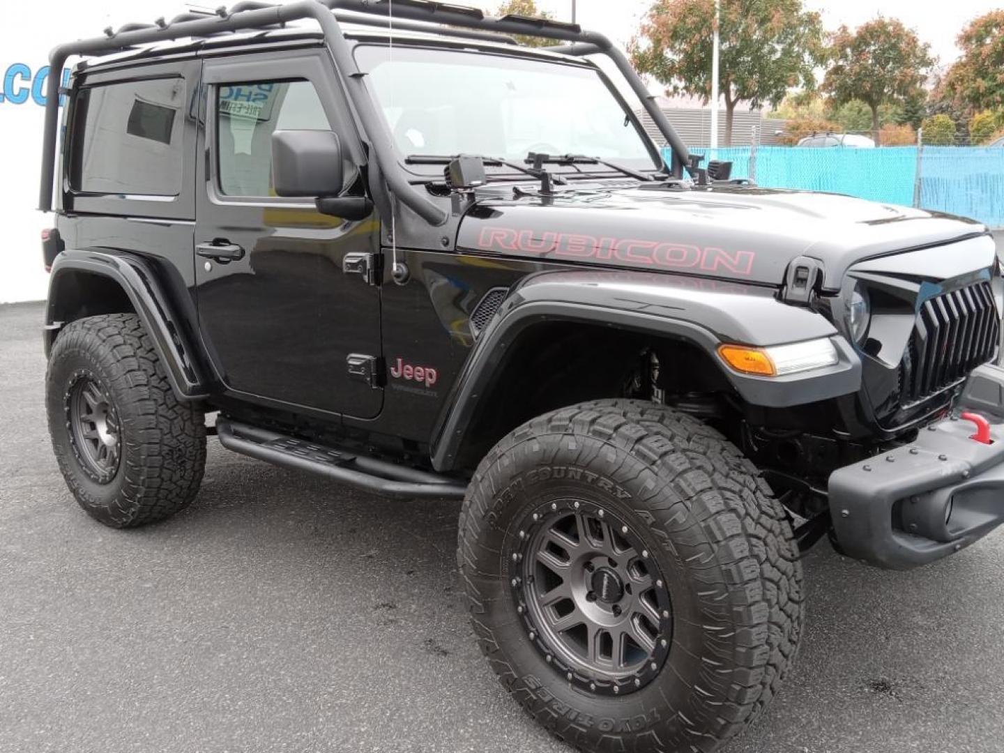 2020 BLACK Jeep Wrangler Rubicon (1C4HJXCG9LW) with an 3.6L V6 DOHC 24V FFV engine, 6A transmission, located at 6064 Gull Rd, Kalamazoo, MI, 49048, (269) 222-0088, 42.328388, -85.512924 - Protect this model from unwanted accidents with a cutting edge backup camera system. Bluetooth technology is built into this Jeep Wrangler, keeping your hands on the steering wheel and your focus on the road. This mid-size suv offers Apple CarPlay for seamless connectivity. This Jeep Wrangler has a - Photo#4