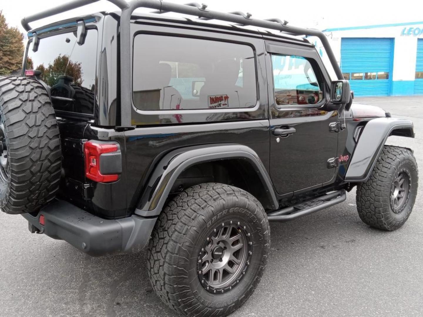 2020 BLACK Jeep Wrangler Rubicon (1C4HJXCG9LW) with an 3.6L V6 DOHC 24V FFV engine, 6A transmission, located at 6064 Gull Rd, Kalamazoo, MI, 49048, (269) 222-0088, 42.328388, -85.512924 - Protect this model from unwanted accidents with a cutting edge backup camera system. Bluetooth technology is built into this Jeep Wrangler, keeping your hands on the steering wheel and your focus on the road. This mid-size suv offers Apple CarPlay for seamless connectivity. This Jeep Wrangler has a - Photo#5