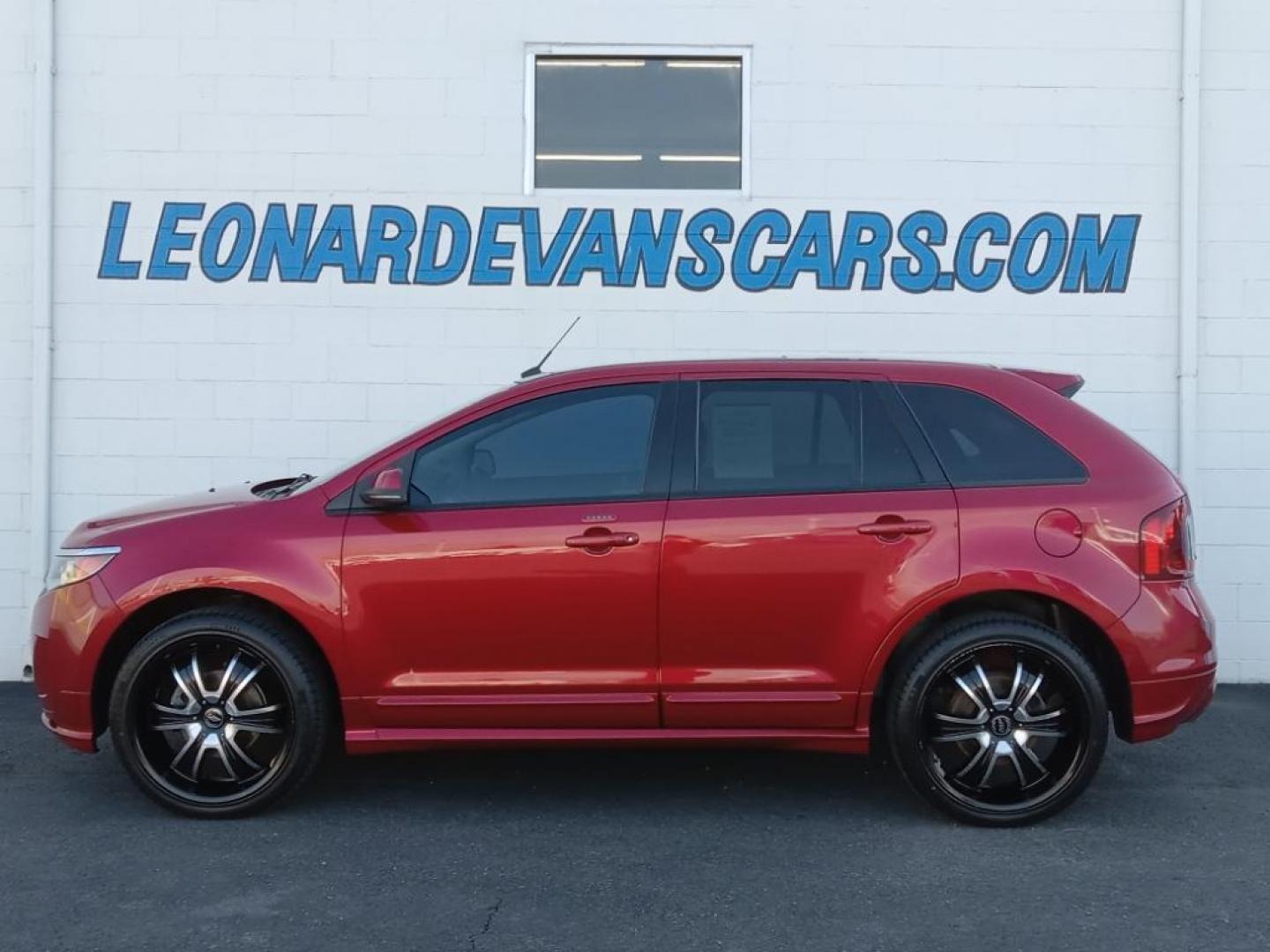 2012 Red Candy Metallic Tinted Clearcoat /Charcoal Black/Silver Smoke Ford Edge Sport AWD (2FMDK4AK3CB) with an 3.7L V6 DOHC 24V engine, 6-Speed Automatic transmission, located at 6064 Gull Rd, Kalamazoo, MI, 49048, (269) 222-0088, 42.328388, -85.512924 - <b>Equipment</b><br>Never get into a cold vehicle again with the remote start feature on this vehicle. This model has a clean AutoCheck report, ensuring its impeccable vehicle history. The state of the art park assist system will guide you easily into any spot. This model features a hands-free Bluet - Photo#1