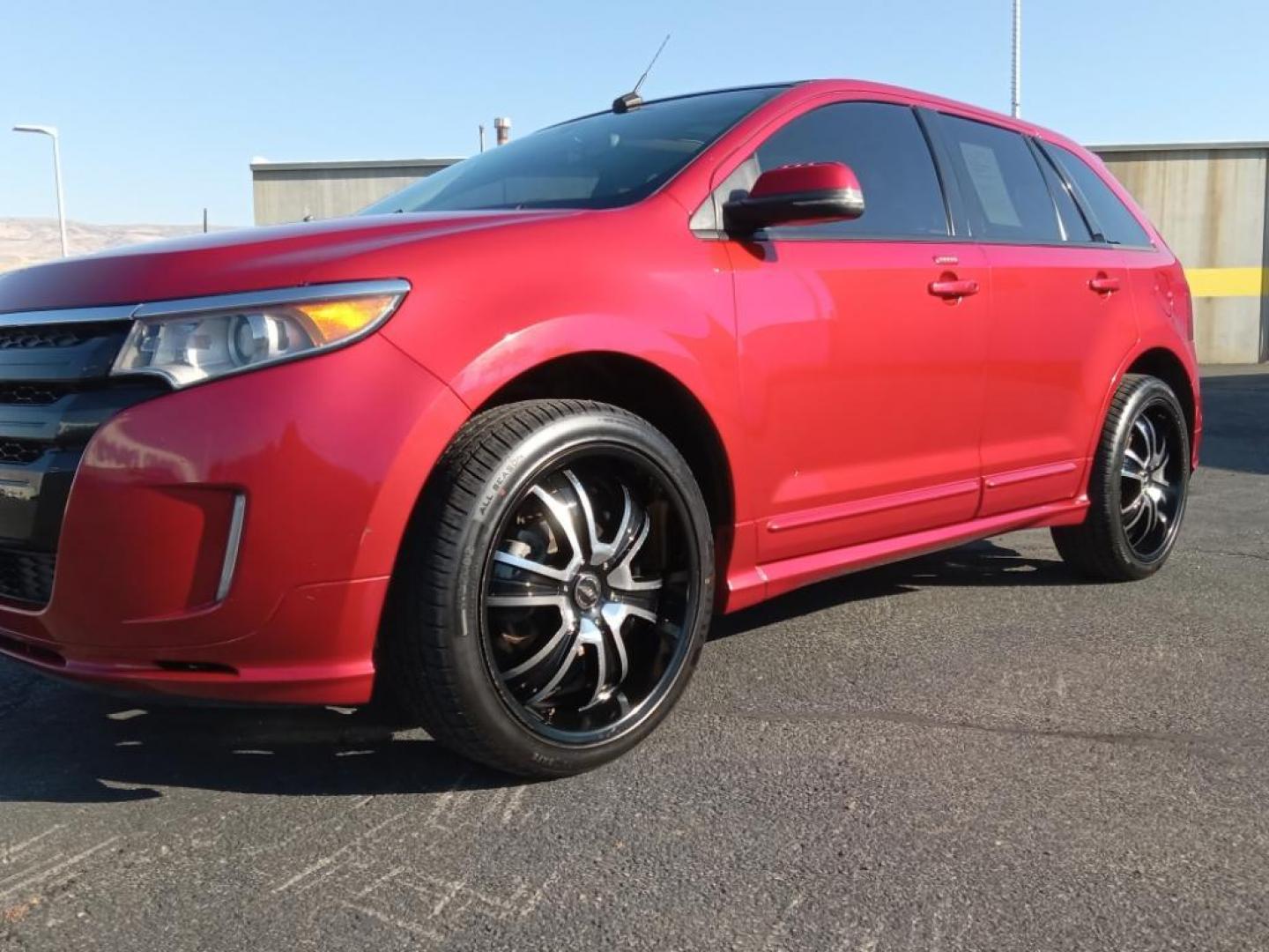 2012 Red Candy Metallic Tinted Clearcoat /Charcoal Black/Silver Smoke Ford Edge Sport AWD (2FMDK4AK3CB) with an 3.7L V6 DOHC 24V engine, 6-Speed Automatic transmission, located at 6064 Gull Rd, Kalamazoo, MI, 49048, (269) 222-0088, 42.328388, -85.512924 - <b>Equipment</b><br>Never get into a cold vehicle again with the remote start feature on this vehicle. This model has a clean AutoCheck report, ensuring its impeccable vehicle history. The state of the art park assist system will guide you easily into any spot. This model features a hands-free Bluet - Photo#2