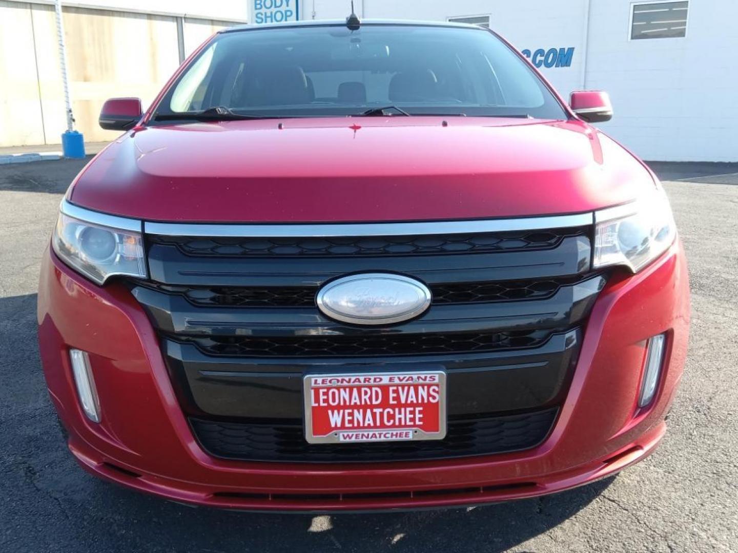 2012 Red Candy Metallic Tinted Clearcoat /Charcoal Black/Silver Smoke Ford Edge Sport AWD (2FMDK4AK3CB) with an 3.7L V6 DOHC 24V engine, 6-Speed Automatic transmission, located at 6064 Gull Rd, Kalamazoo, MI, 49048, (269) 222-0088, 42.328388, -85.512924 - <b>Equipment</b><br>Never get into a cold vehicle again with the remote start feature on this vehicle. This model has a clean AutoCheck report, ensuring its impeccable vehicle history. The state of the art park assist system will guide you easily into any spot. This model features a hands-free Bluet - Photo#3