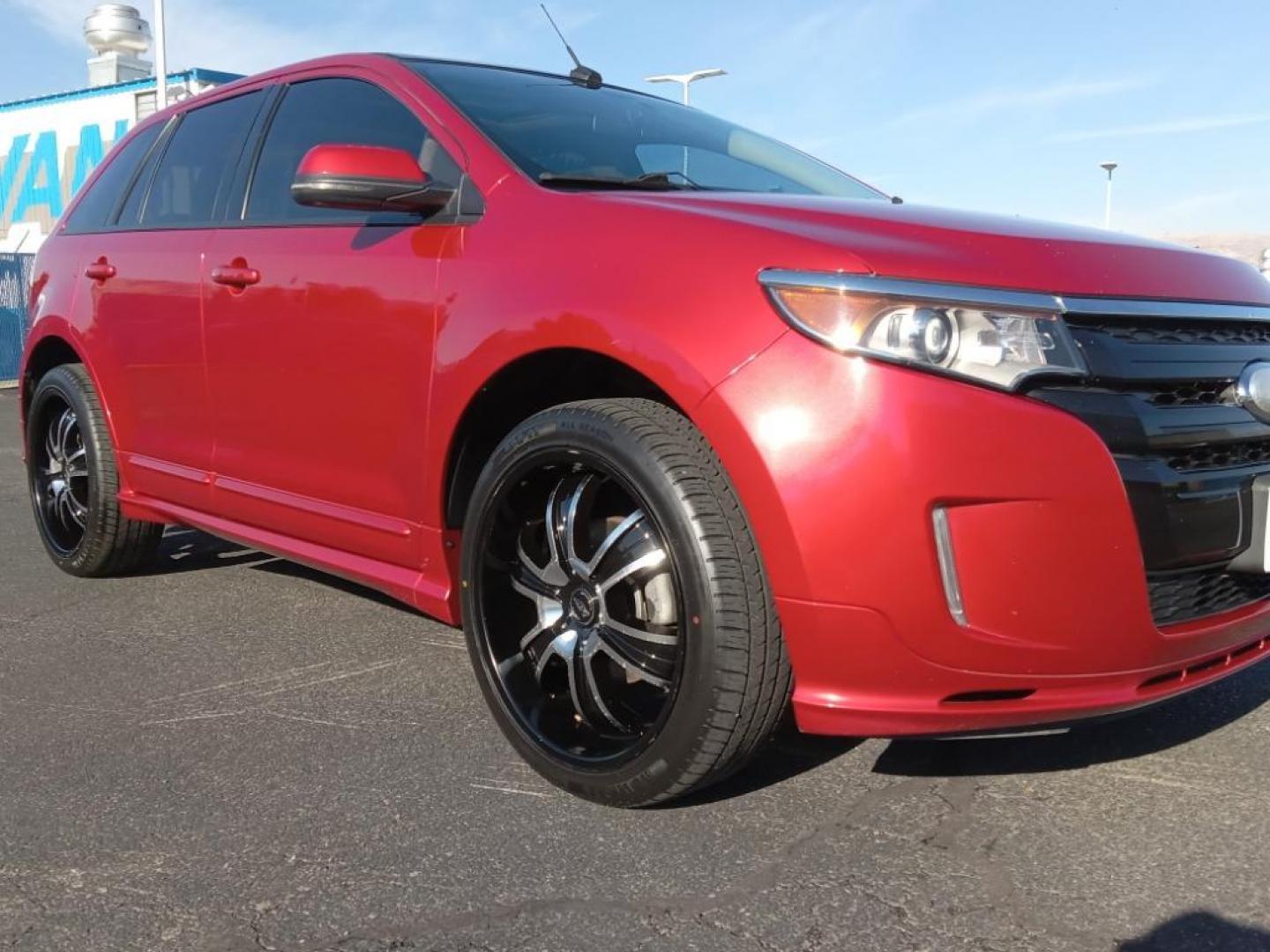 2012 Red Candy Metallic Tinted Clearcoat /Charcoal Black/Silver Smoke Ford Edge Sport AWD (2FMDK4AK3CB) with an 3.7L V6 DOHC 24V engine, 6-Speed Automatic transmission, located at 6064 Gull Rd, Kalamazoo, MI, 49048, (269) 222-0088, 42.328388, -85.512924 - <b>Equipment</b><br>Never get into a cold vehicle again with the remote start feature on this vehicle. This model has a clean AutoCheck report, ensuring its impeccable vehicle history. The state of the art park assist system will guide you easily into any spot. This model features a hands-free Bluet - Photo#4