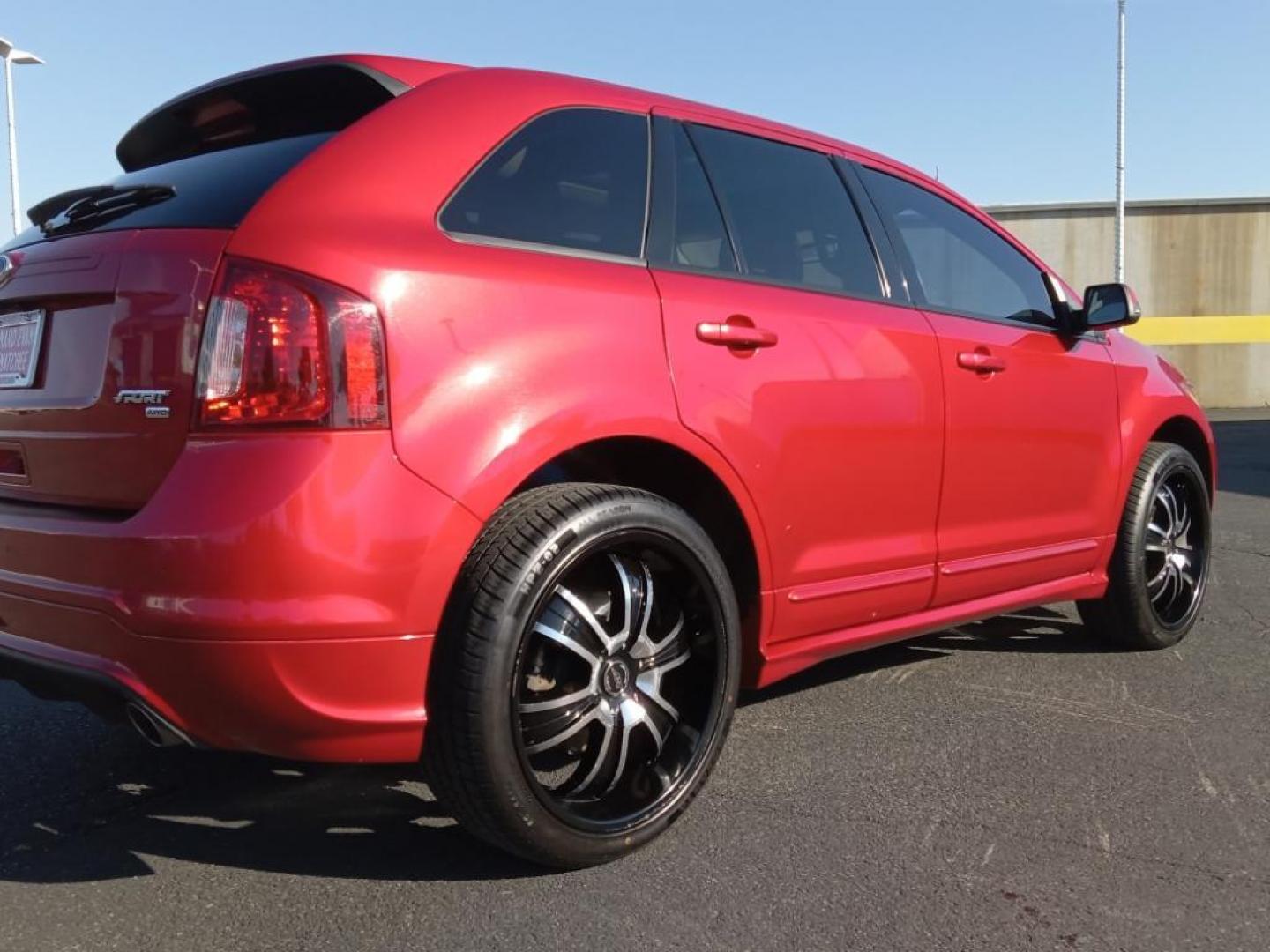 2012 Red Candy Metallic Tinted Clearcoat /Charcoal Black/Silver Smoke Ford Edge Sport AWD (2FMDK4AK3CB) with an 3.7L V6 DOHC 24V engine, 6-Speed Automatic transmission, located at 6064 Gull Rd, Kalamazoo, MI, 49048, (269) 222-0088, 42.328388, -85.512924 - <b>Equipment</b><br>Never get into a cold vehicle again with the remote start feature on this vehicle. This model has a clean AutoCheck report, ensuring its impeccable vehicle history. The state of the art park assist system will guide you easily into any spot. This model features a hands-free Bluet - Photo#5