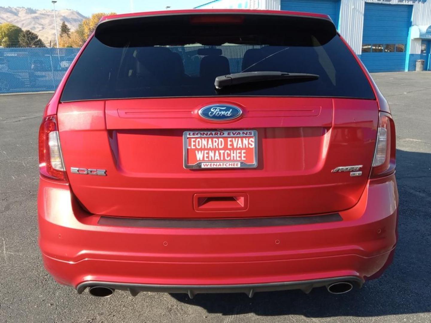 2012 Red Candy Metallic Tinted Clearcoat /Charcoal Black/Silver Smoke Ford Edge Sport AWD (2FMDK4AK3CB) with an 3.7L V6 DOHC 24V engine, 6-Speed Automatic transmission, located at 6064 Gull Rd, Kalamazoo, MI, 49048, (269) 222-0088, 42.328388, -85.512924 - <b>Equipment</b><br>Never get into a cold vehicle again with the remote start feature on this vehicle. This model has a clean AutoCheck report, ensuring its impeccable vehicle history. The state of the art park assist system will guide you easily into any spot. This model features a hands-free Bluet - Photo#6