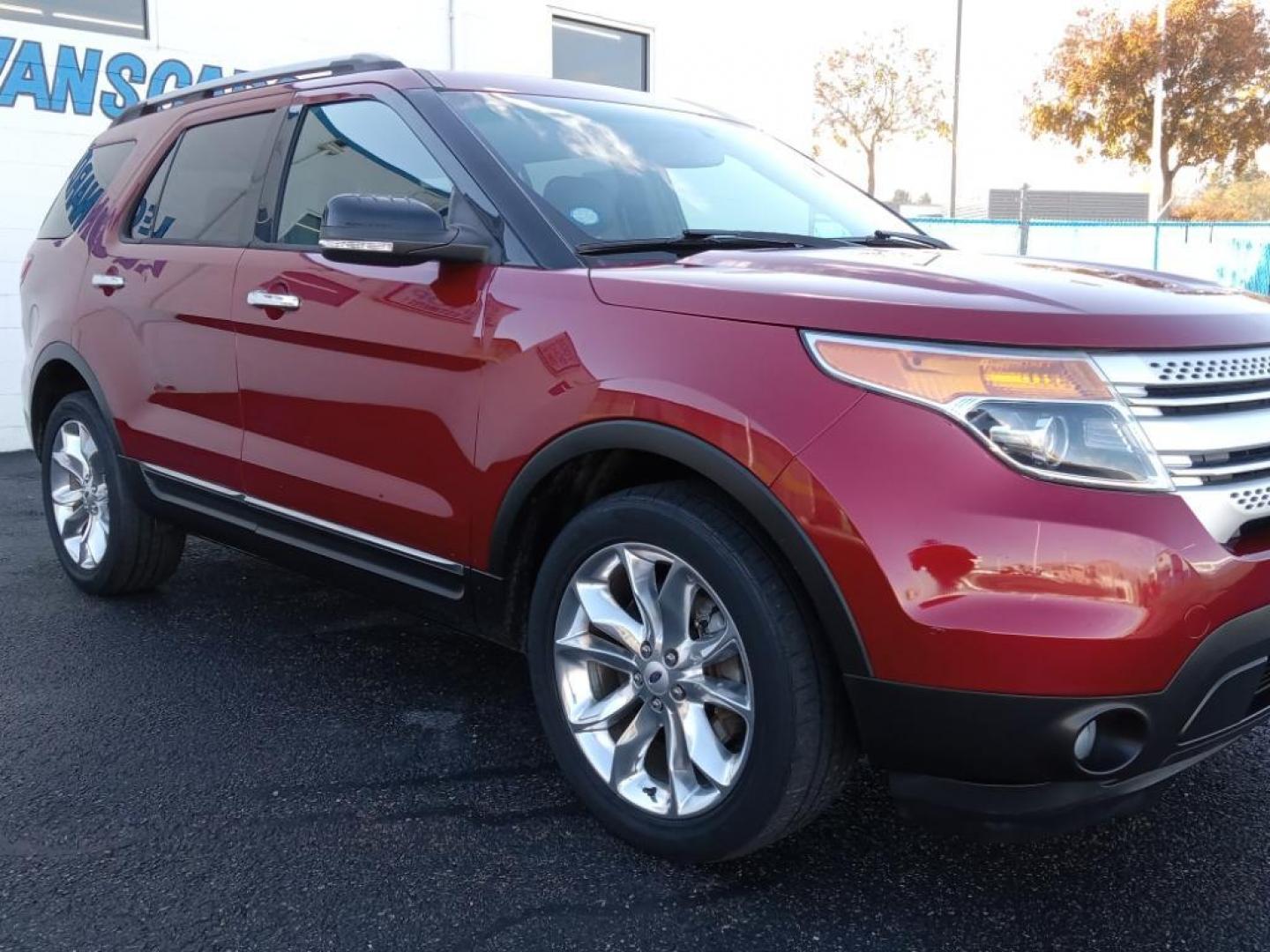 2014 Ruby Red Metallic Tinted Clearcoat /Medium Light Stone Ford Explorer XLT 4WD (1FM5K8D88EG) with an 3.5L V6 DOHC 24V engine, 6-Speed Automatic transmission, located at 6064 Gull Rd, Kalamazoo, MI, 49048, (269) 222-0088, 42.328388, -85.512924 - <b>Equipment</b><br>The leather seats in this 1/2 ton suv are a must for buyers looking for comfort, durability, and style. Bluetooth technology is built into this vehicle, keeping your hands on the steering wheel and your focus on the road. The installed navigation system will keep you on the right - Photo#4