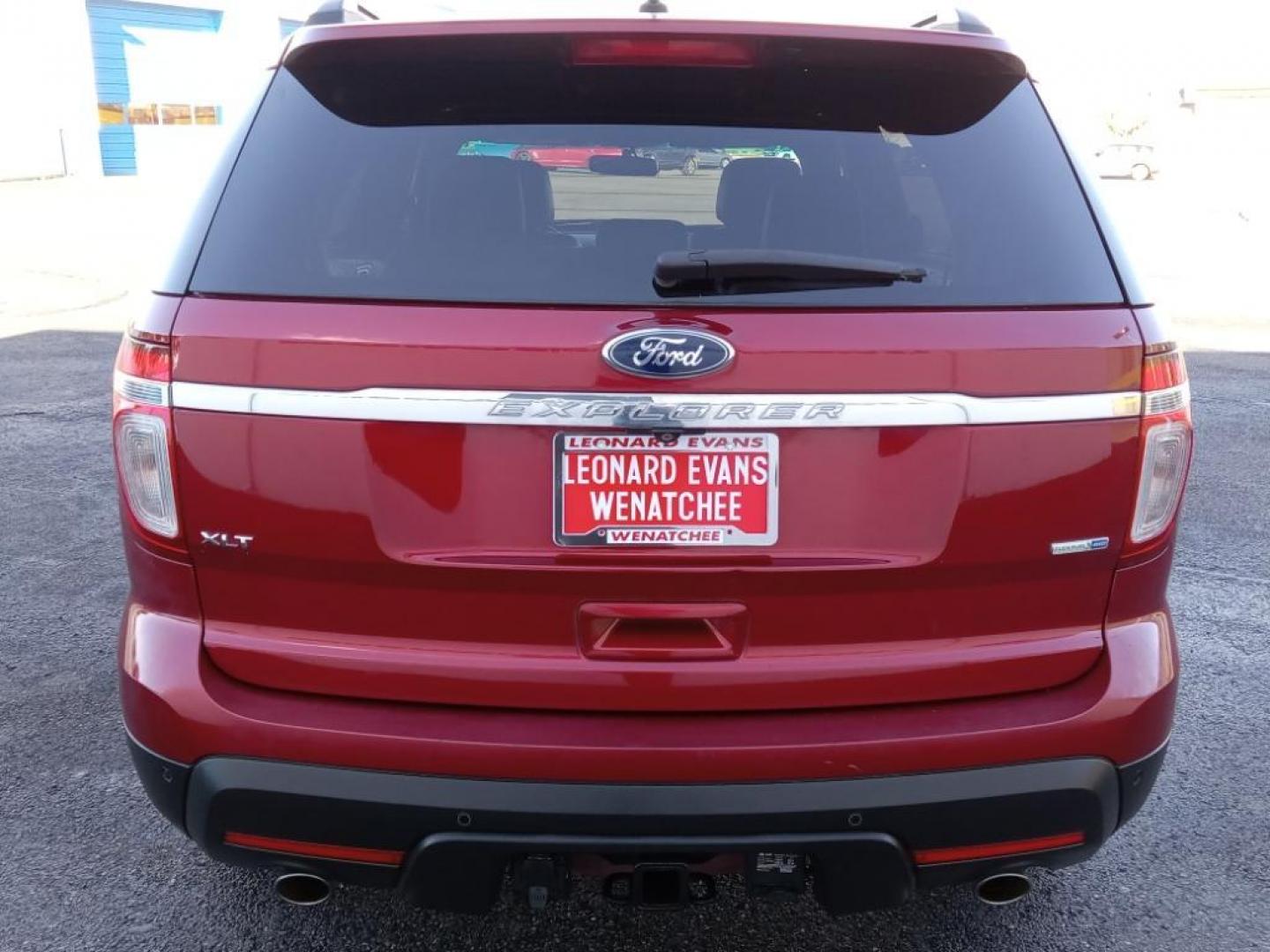 2014 Ruby Red Metallic Tinted Clearcoat /Medium Light Stone Ford Explorer XLT 4WD (1FM5K8D88EG) with an 3.5L V6 DOHC 24V engine, 6-Speed Automatic transmission, located at 6064 Gull Rd, Kalamazoo, MI, 49048, (269) 222-0088, 42.328388, -85.512924 - <b>Equipment</b><br>The leather seats in this 1/2 ton suv are a must for buyers looking for comfort, durability, and style. Bluetooth technology is built into this vehicle, keeping your hands on the steering wheel and your focus on the road. The installed navigation system will keep you on the right - Photo#6