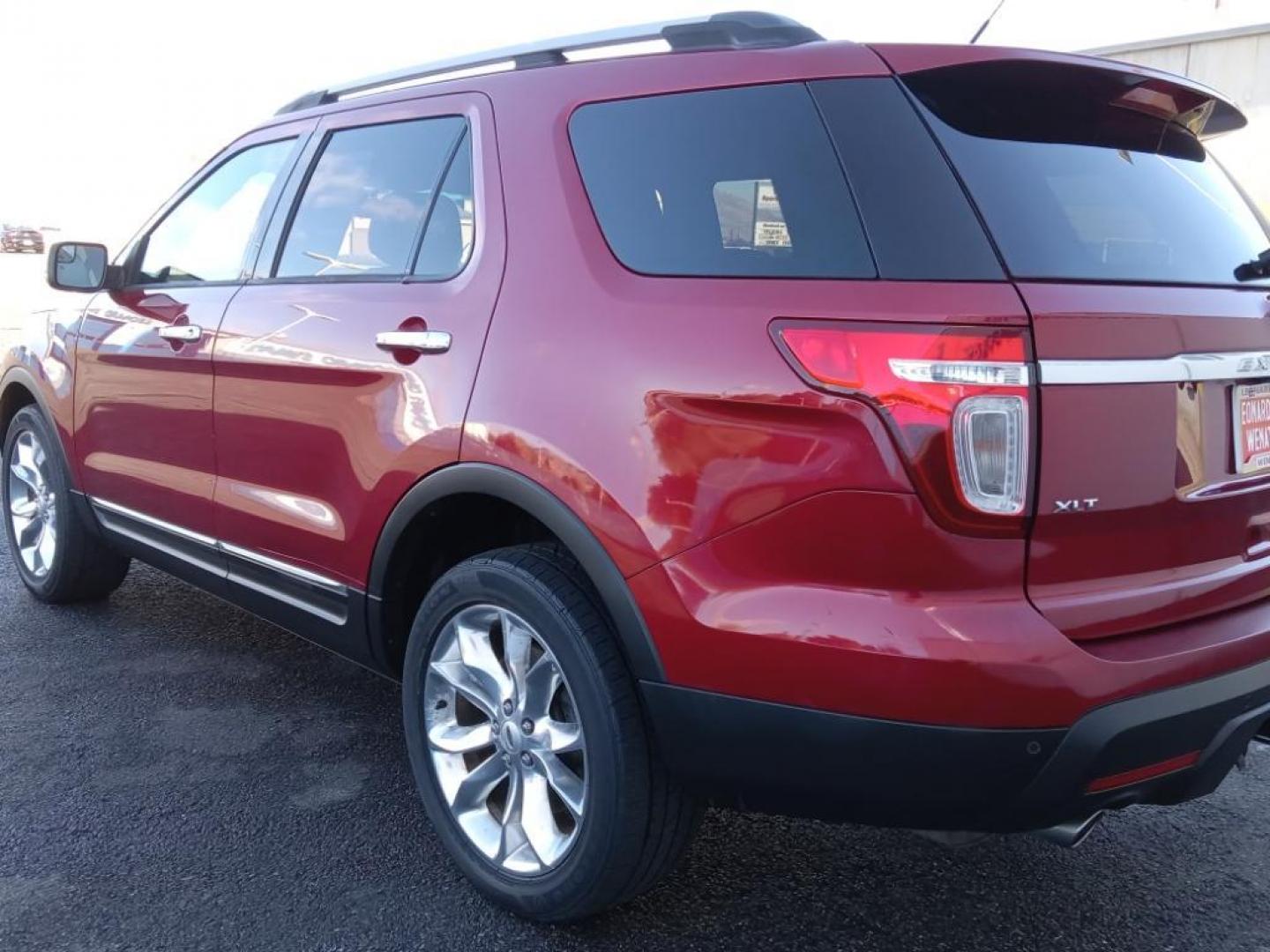 2014 Ruby Red Metallic Tinted Clearcoat /Medium Light Stone Ford Explorer XLT 4WD (1FM5K8D88EG) with an 3.5L V6 DOHC 24V engine, 6-Speed Automatic transmission, located at 6064 Gull Rd, Kalamazoo, MI, 49048, (269) 222-0088, 42.328388, -85.512924 - <b>Equipment</b><br>The leather seats in this 1/2 ton suv are a must for buyers looking for comfort, durability, and style. Bluetooth technology is built into this vehicle, keeping your hands on the steering wheel and your focus on the road. The installed navigation system will keep you on the right - Photo#7