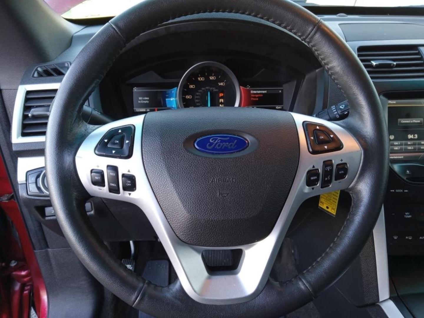 2014 Ruby Red Metallic Tinted Clearcoat /Medium Light Stone Ford Explorer XLT 4WD (1FM5K8D88EG) with an 3.5L V6 DOHC 24V engine, 6-Speed Automatic transmission, located at 6064 Gull Rd, Kalamazoo, MI, 49048, (269) 222-0088, 42.328388, -85.512924 - <b>Equipment</b><br>The leather seats in this 1/2 ton suv are a must for buyers looking for comfort, durability, and style. Bluetooth technology is built into this vehicle, keeping your hands on the steering wheel and your focus on the road. The installed navigation system will keep you on the right - Photo#10