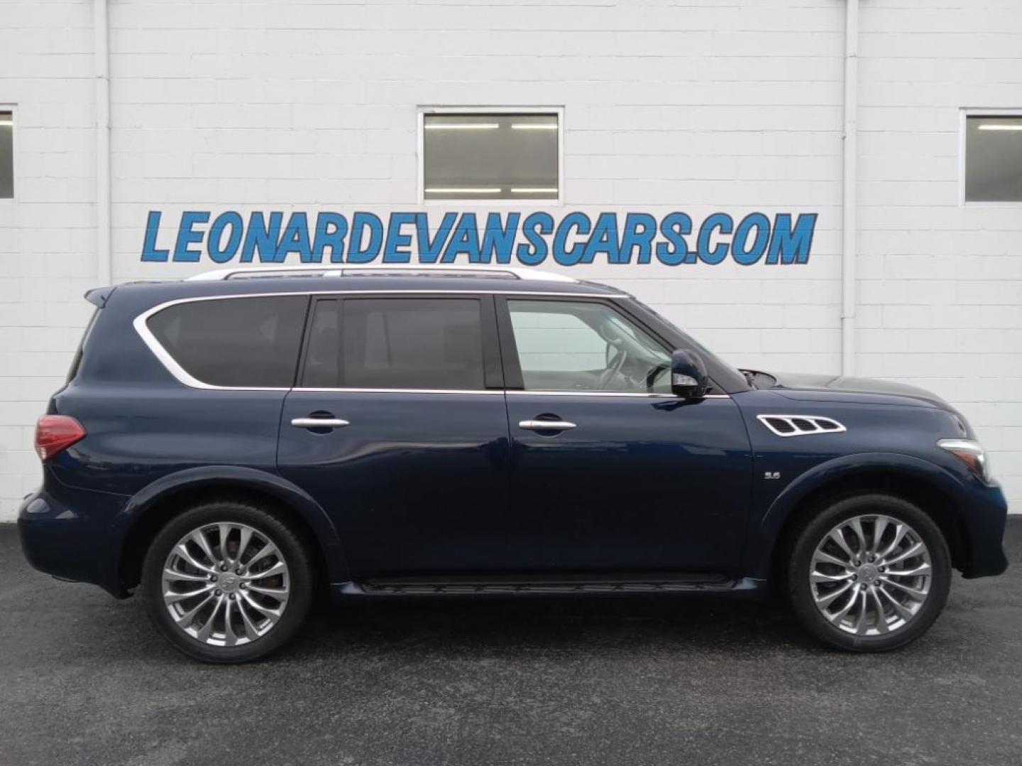 2015 Hermosa Blue /Wheat Infiniti QX80 4WD (JN8AZ2NC6F9) with an 5.6L V8 DOHC 32V engine, 7-Speed Automatic transmission, located at 6064 Gull Rd, Kalamazoo, MI, 49048, (269) 222-0088, 42.328388, -85.512924 - <b>Equipment</b><br>The vehicle's Forward Collision Warning system alerts the driver to potential front-end collisions, enhancing safety. It's AutoCheck: 1 owner, assurance of single-owner history for peace of mind. The state of the art park assist system will guide you easily into any spot. This ve - Photo#0