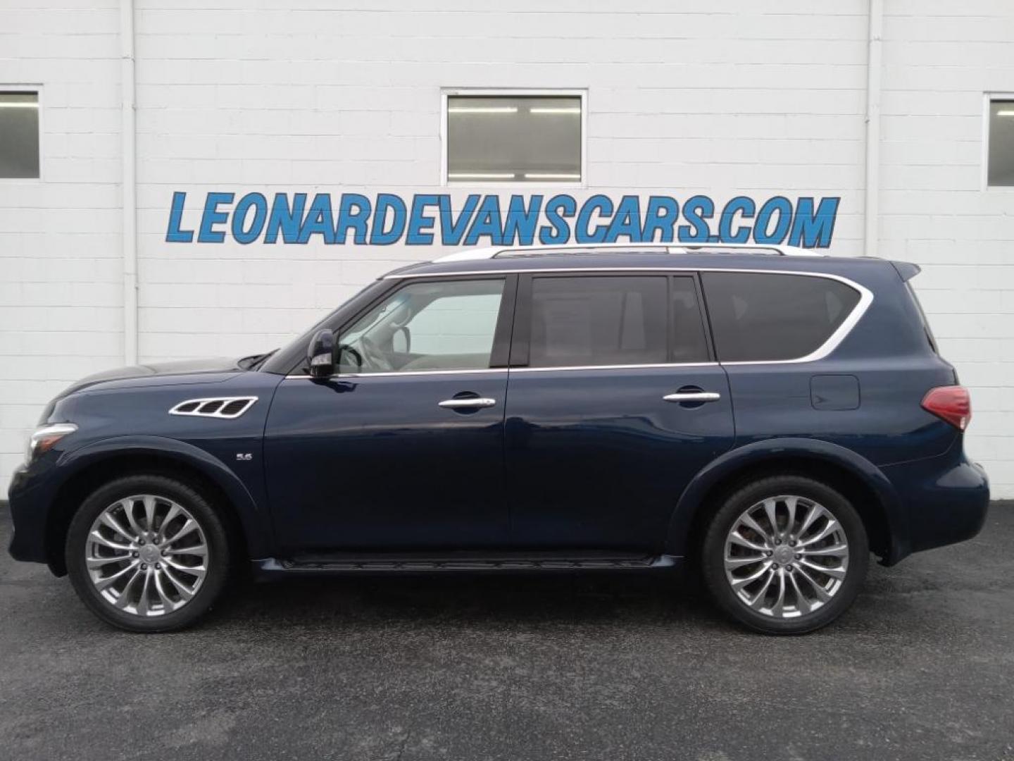 2015 Hermosa Blue /Wheat Infiniti QX80 4WD (JN8AZ2NC6F9) with an 5.6L V8 DOHC 32V engine, 7-Speed Automatic transmission, located at 6064 Gull Rd, Kalamazoo, MI, 49048, (269) 222-0088, 42.328388, -85.512924 - <b>Equipment</b><br>The vehicle's Forward Collision Warning system alerts the driver to potential front-end collisions, enhancing safety. It's AutoCheck: 1 owner, assurance of single-owner history for peace of mind. The state of the art park assist system will guide you easily into any spot. This ve - Photo#1